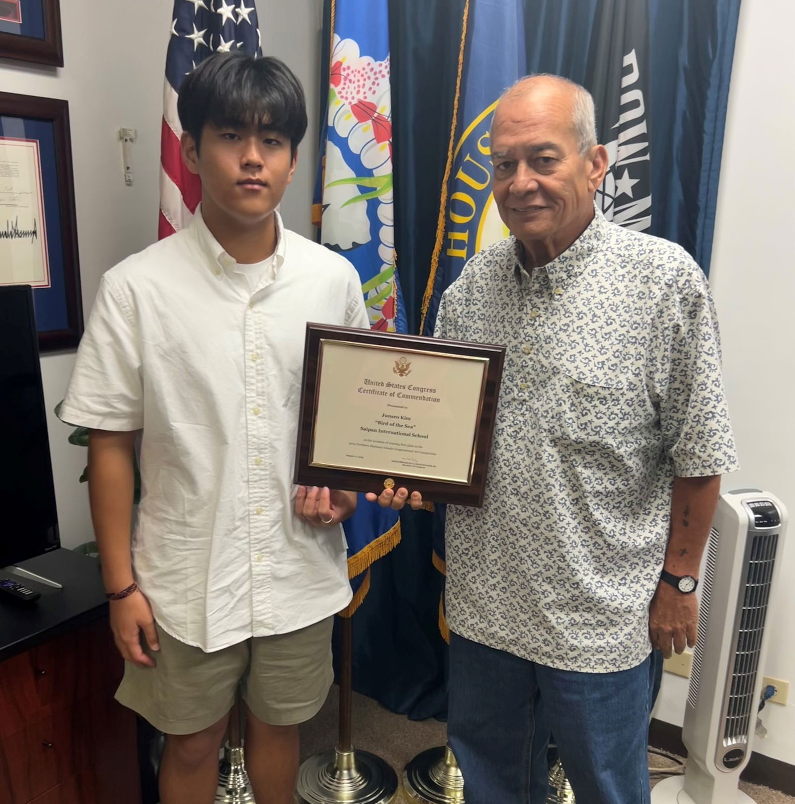 U.S. Congressman Gregorio Kilili Camacho Sablan with 2023 Congressional Art Competition winner Junseo Kim.