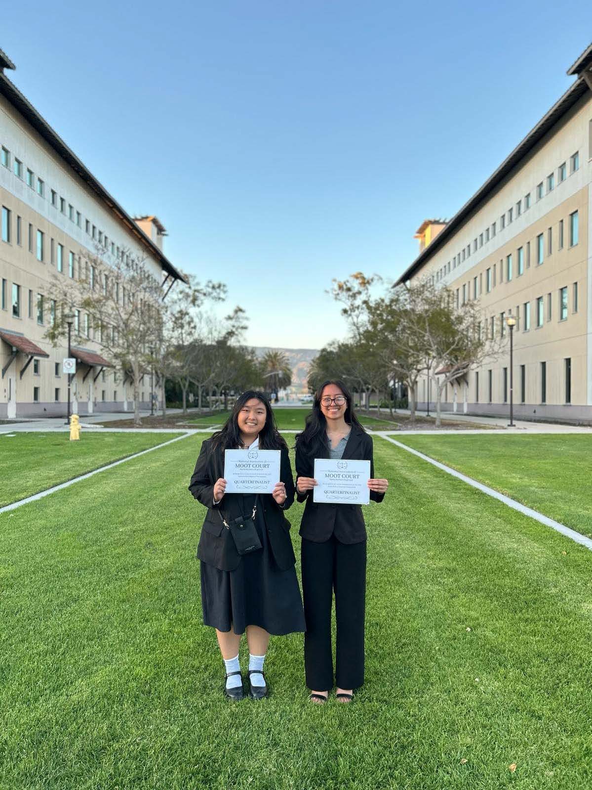 Quarterfinalists Julia Taitano and Princes Habal pose with certificates for their 7th place finish out of 28 regional competitors. They were also the champions of the NMI Moot Court competition in December.