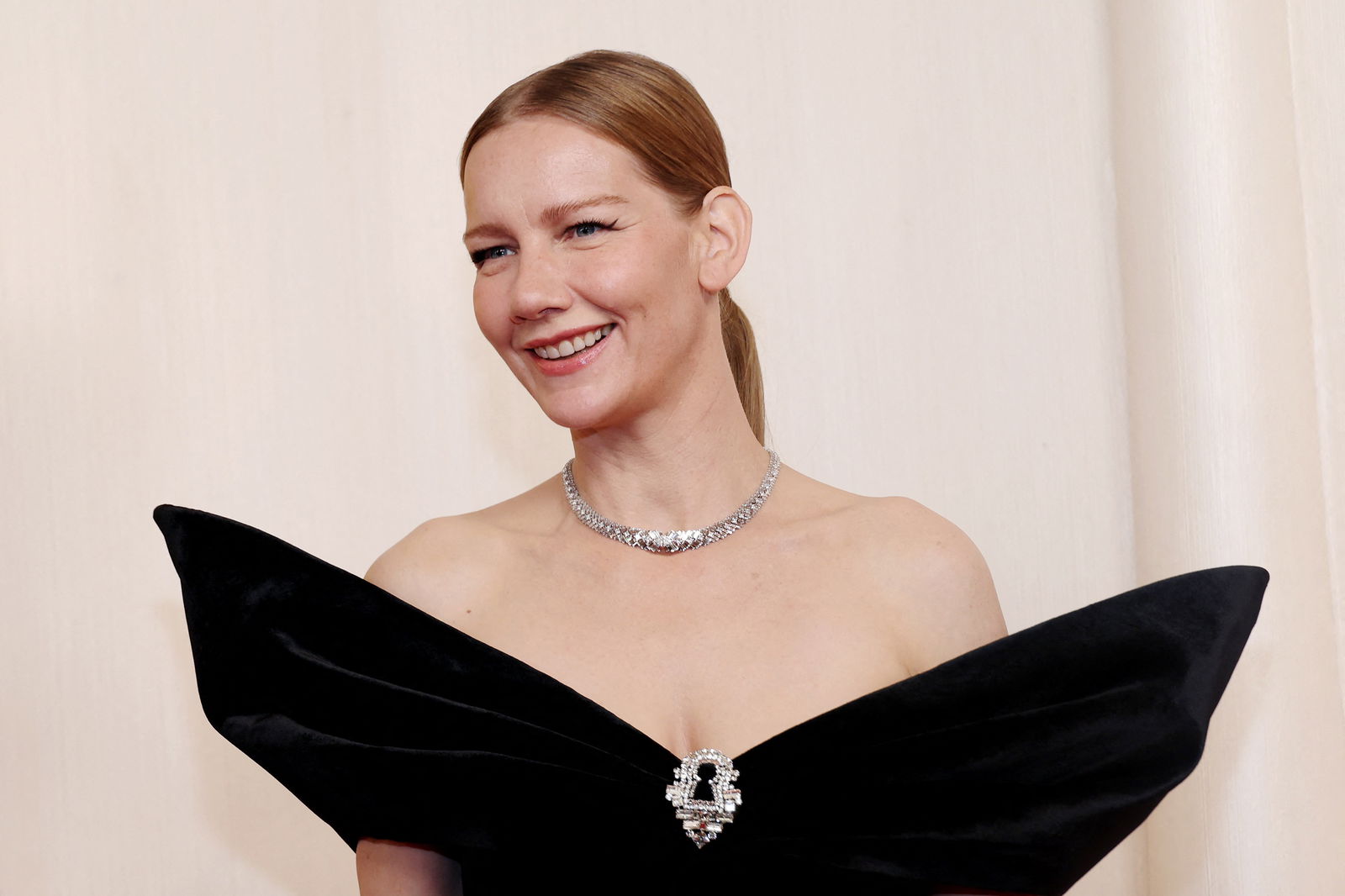 Sandra Huller poses on the red carpet during the Oscars arrivals at the 96th Academy Awards in Hollywood, Los Angeles, California, U.S., March 10, 2024. 