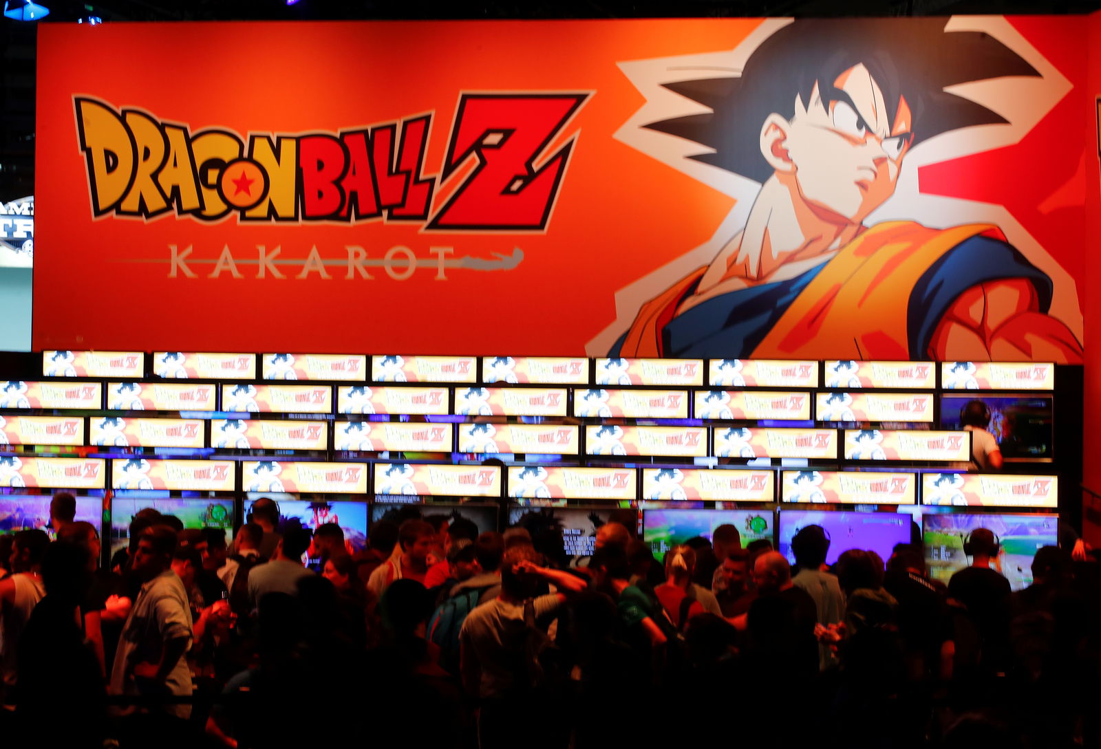 Gamers line up to play Dragonball Z during the first day of Europe's leading digital games fair Gamescom, which showcases the latest trends of the computer gaming scene in Cologne, Germany, August 21, 2019. 