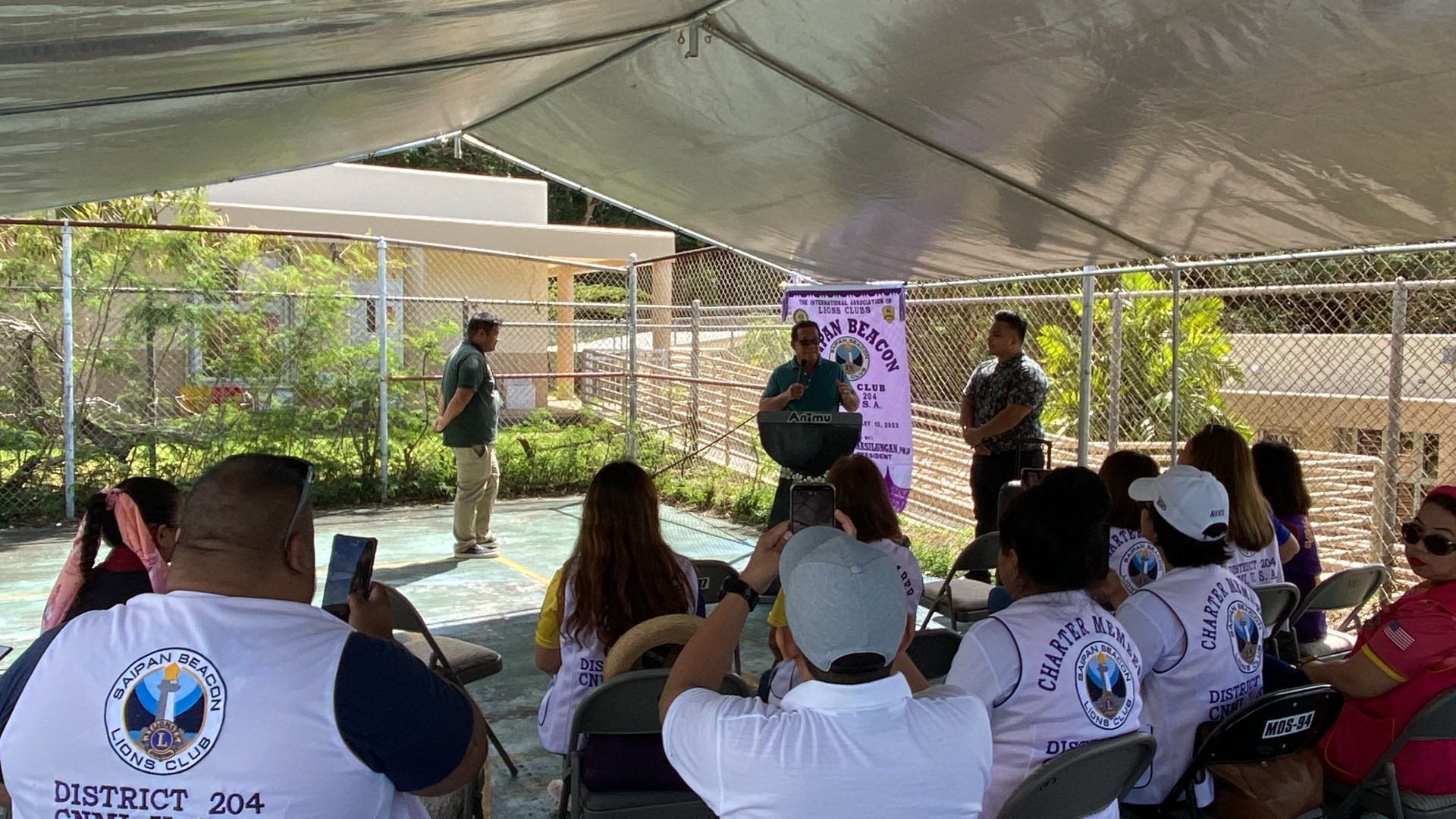 Saipan Mayor RB Camacho speaks to the Beacon Lions at the Chinatown basketball court on Monday.