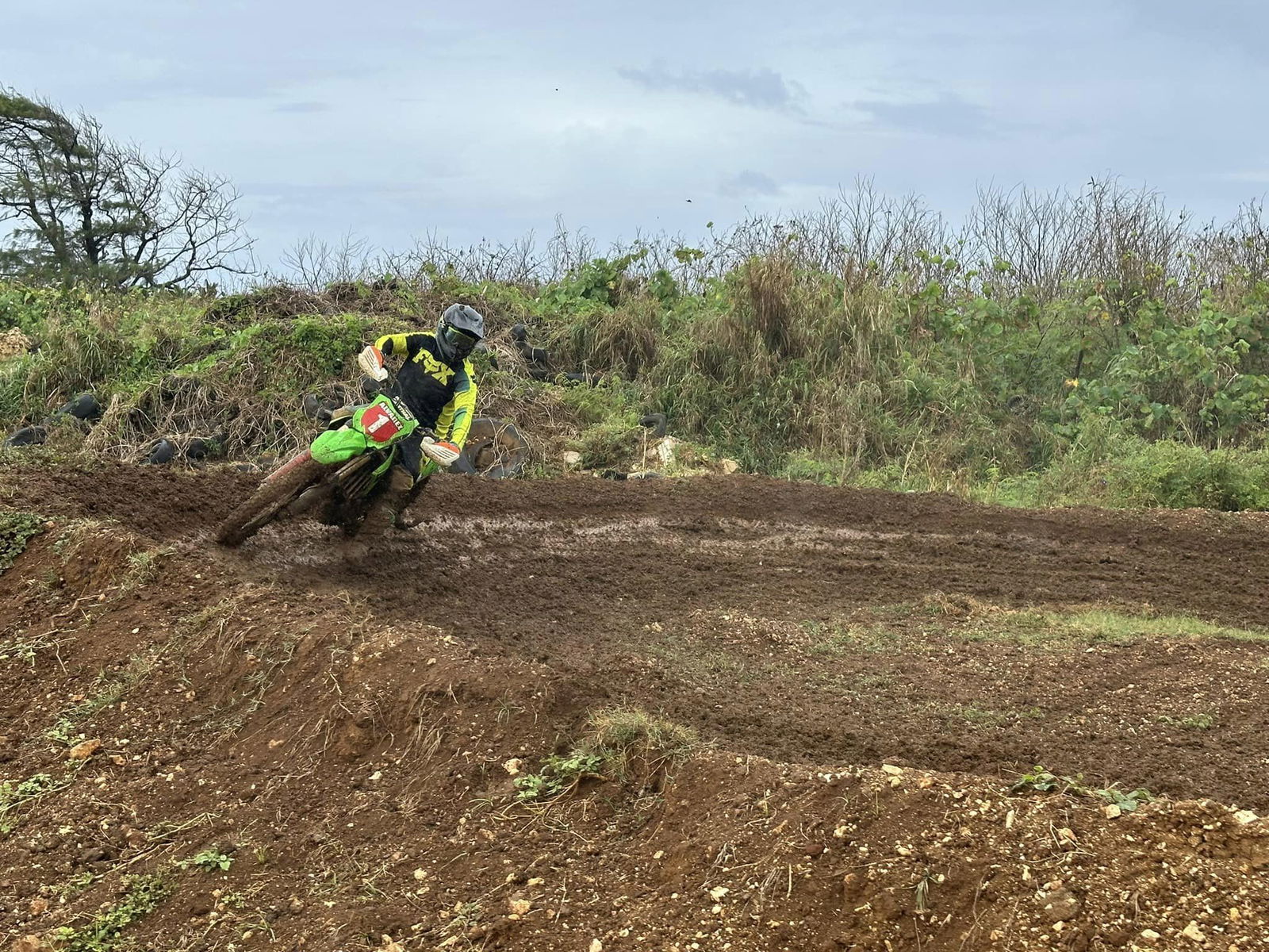 Shane Alvarez executes a tight turn as he battles other racers and a muddy course at Cowtown Raceway Park during round 1 of the Marianas Racing Association’s “Moto IV” 2024 Points Race Series on February 18.