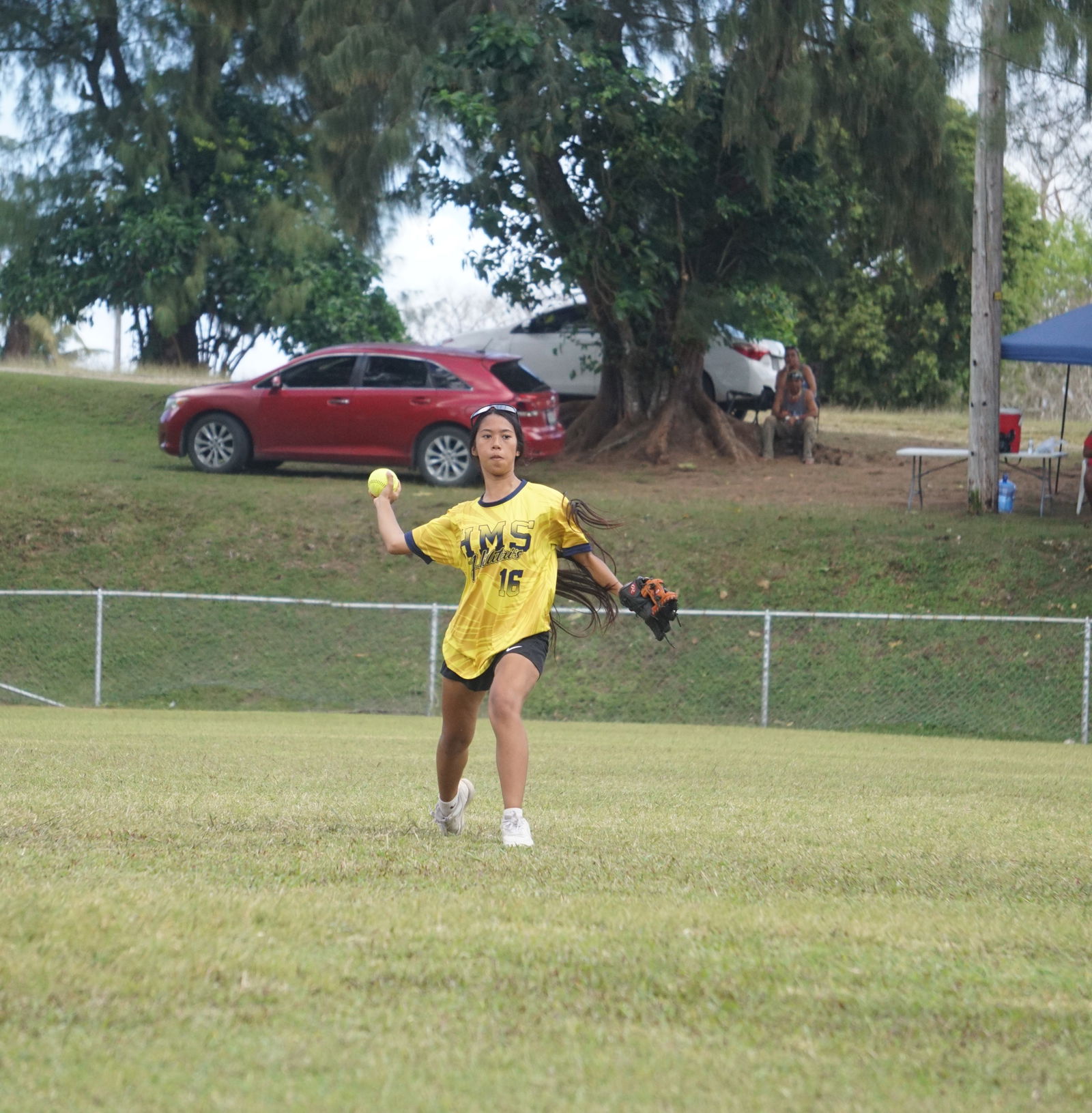 Hopwood Middle School shortstop Paulette Somol throws to first base for the out during the championship game against Tanapag Middle School in the girls middle school division of the SBL-PSS Interscholastic Softball League SY23-24  at the Capital Hill baseball field on Saturday. 