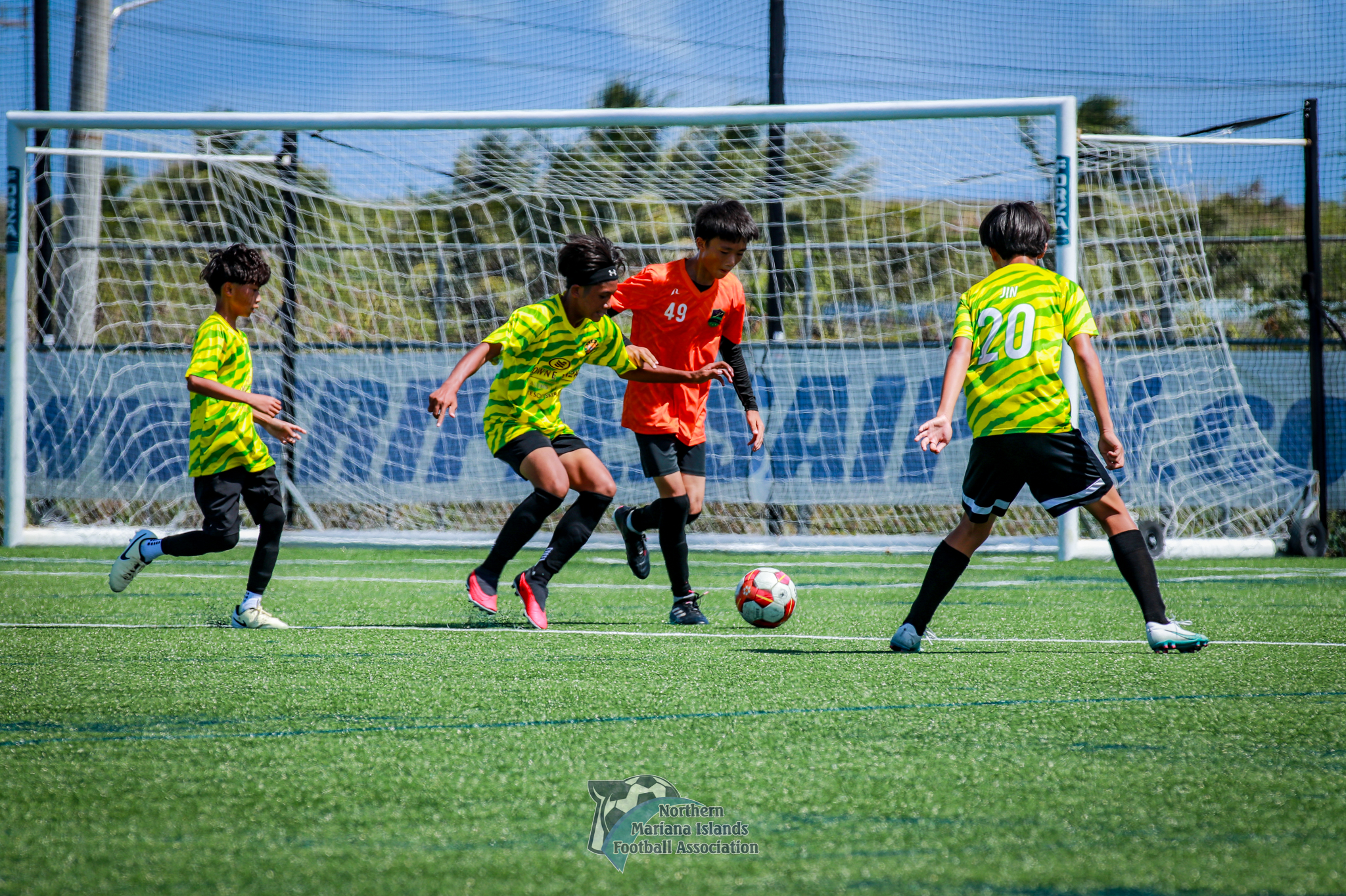 Kanoa FC's Yuxi Lu attempts to control the possession during a game against Matansa FC in the U17 boys division of the TakeCare Youth Soccer League Spring 2024 at the NMI Soccer Training Center in Koblerville.