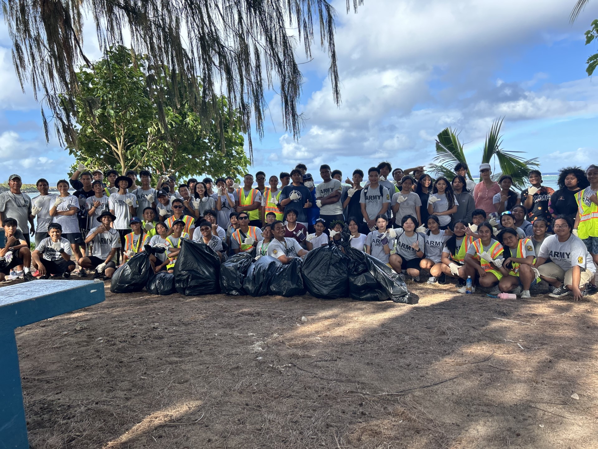 Saipan Southern High School’s Manta Ray Battalion JROTC cadets and their senior army instructor, CSM (Ret.) Richard Basa, pose for a photo at Pakpak Beach where they conducted a cleanup on Saturday morning.