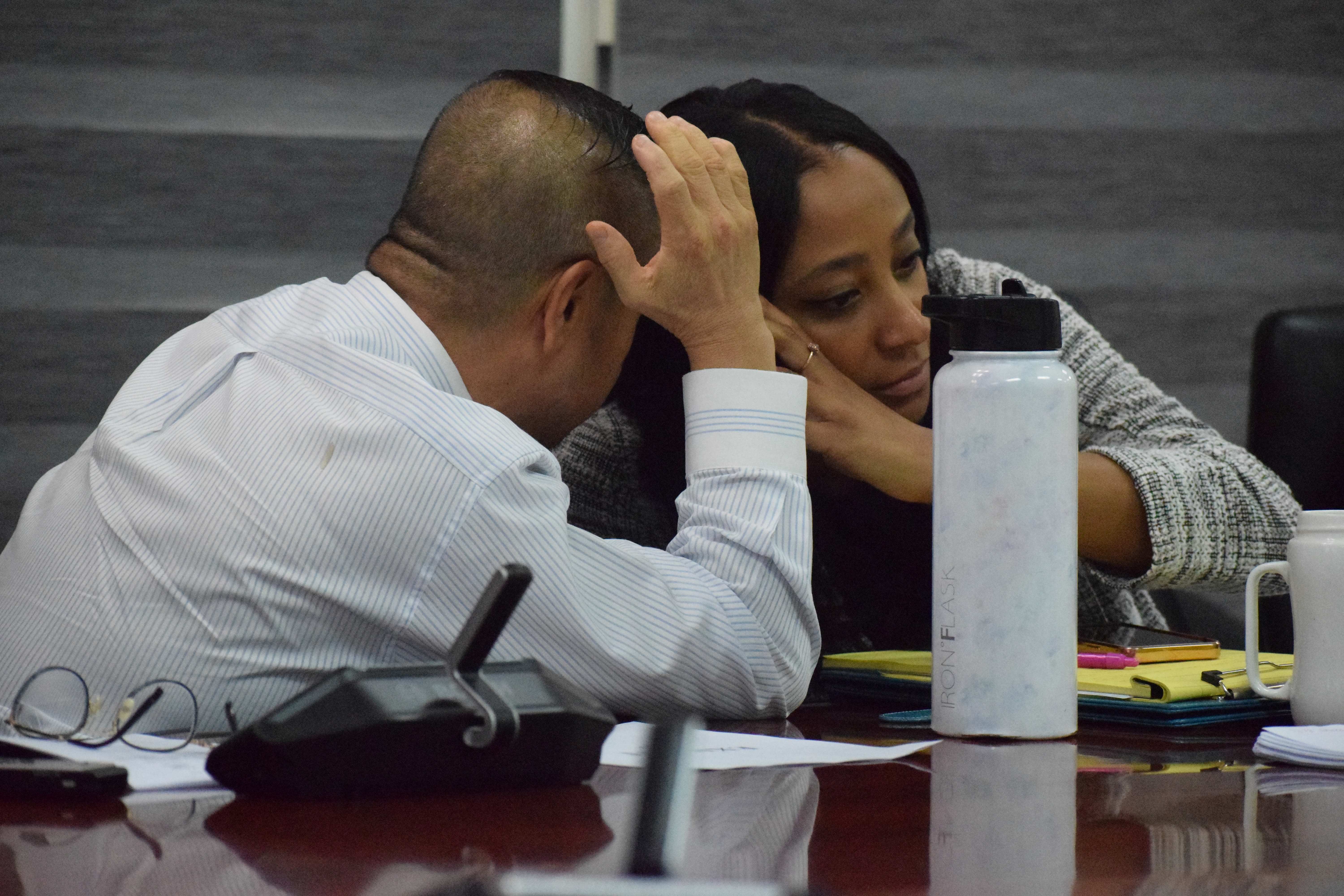 Commonwealth Casino Commission Executive Director Andrew Yeom confers with his legal counsel, Assistant Attorney General Keisha Blaise.