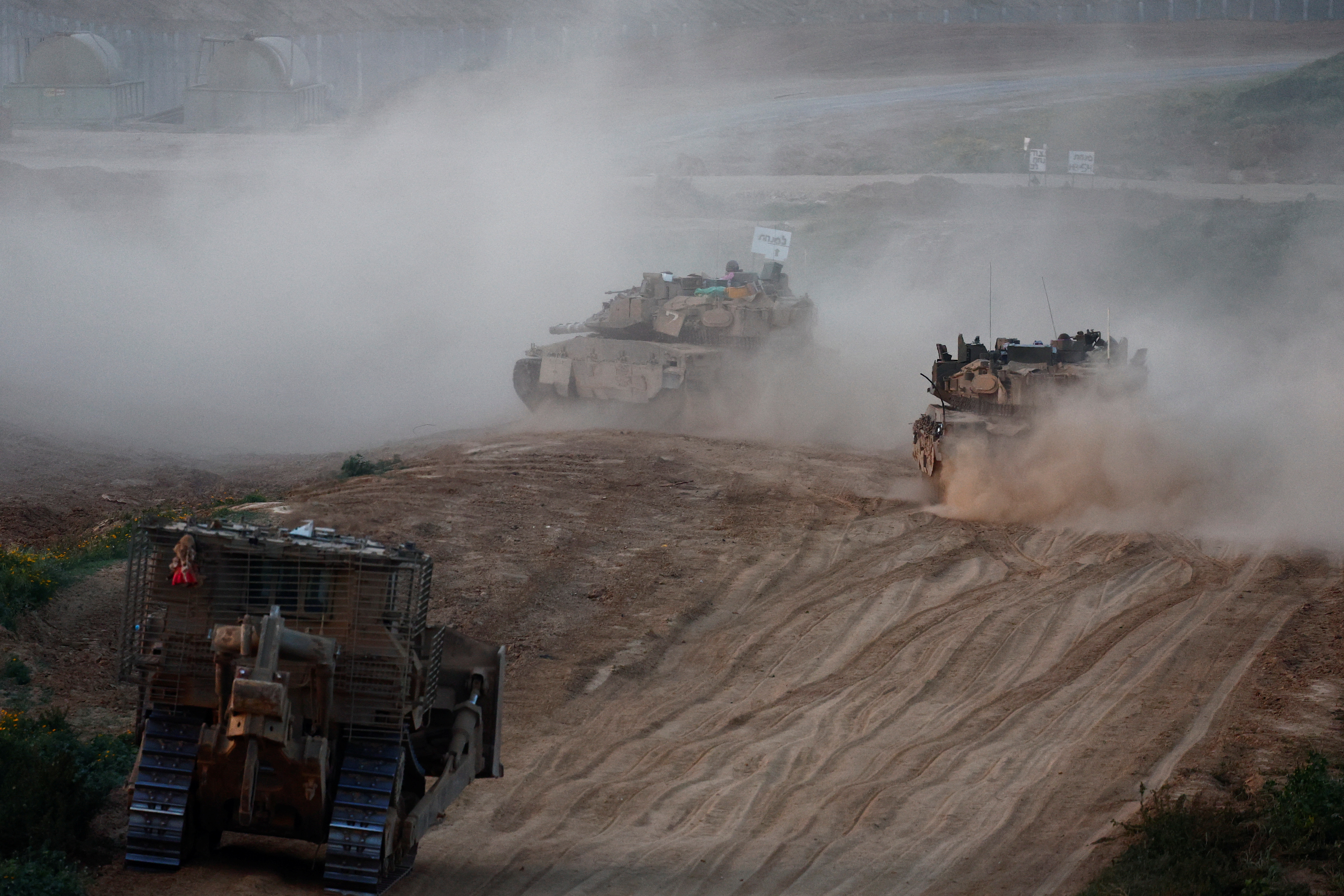 A convoy enters Gaza, amid the ongoing conflict between Israel and Palestinian Islamist group Hamas, in Southern Israel, March 2, 2024. 