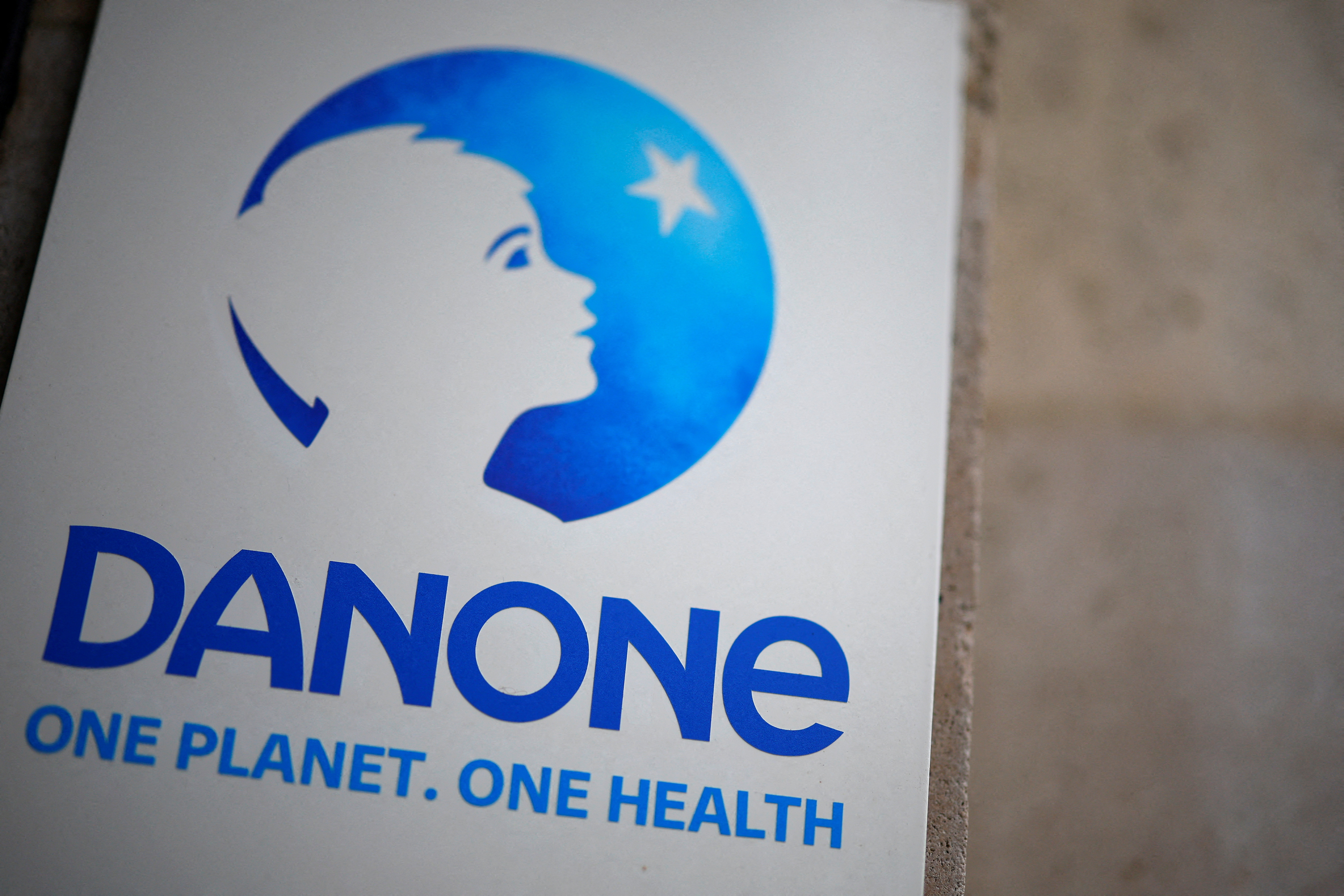 FILE PHOTO: French food group Danone logo is seen at the company headquarters in Paris, France, February 5, 2024. 