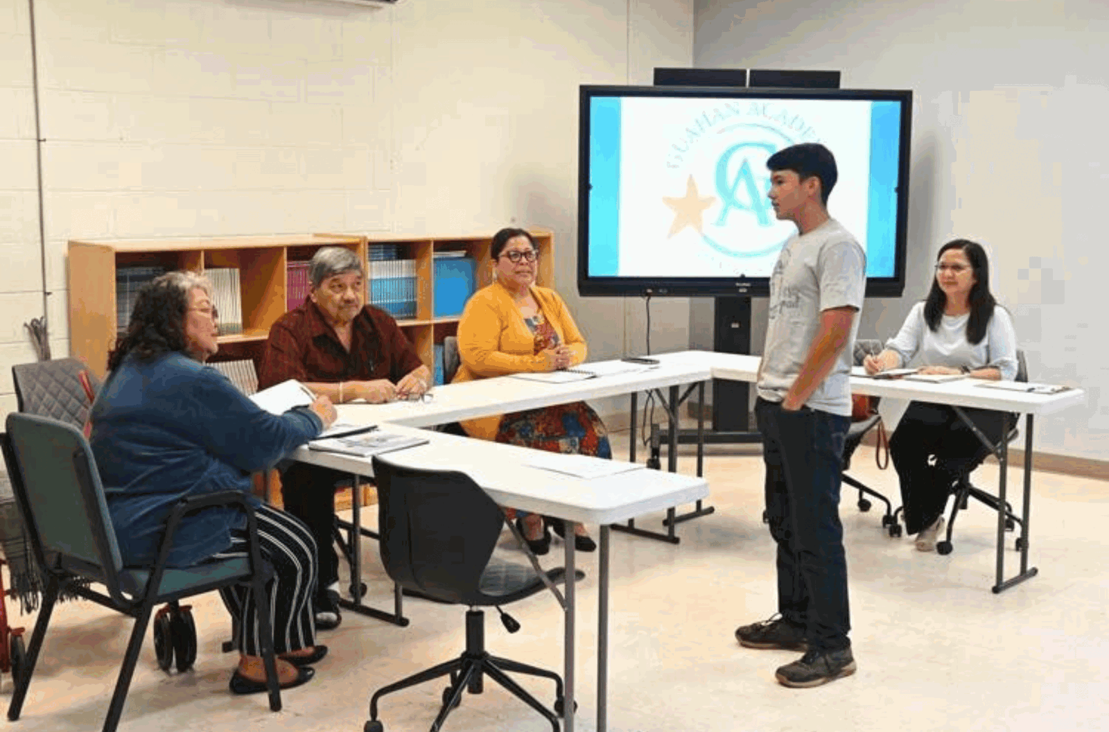 Guahan Academy Charter School student Dallas Cauthen speaks in support of the renewal of the school charter during the Guam Academy Charter Schools Council meeting Thursday, March 14, 2024, in Tiyan. 