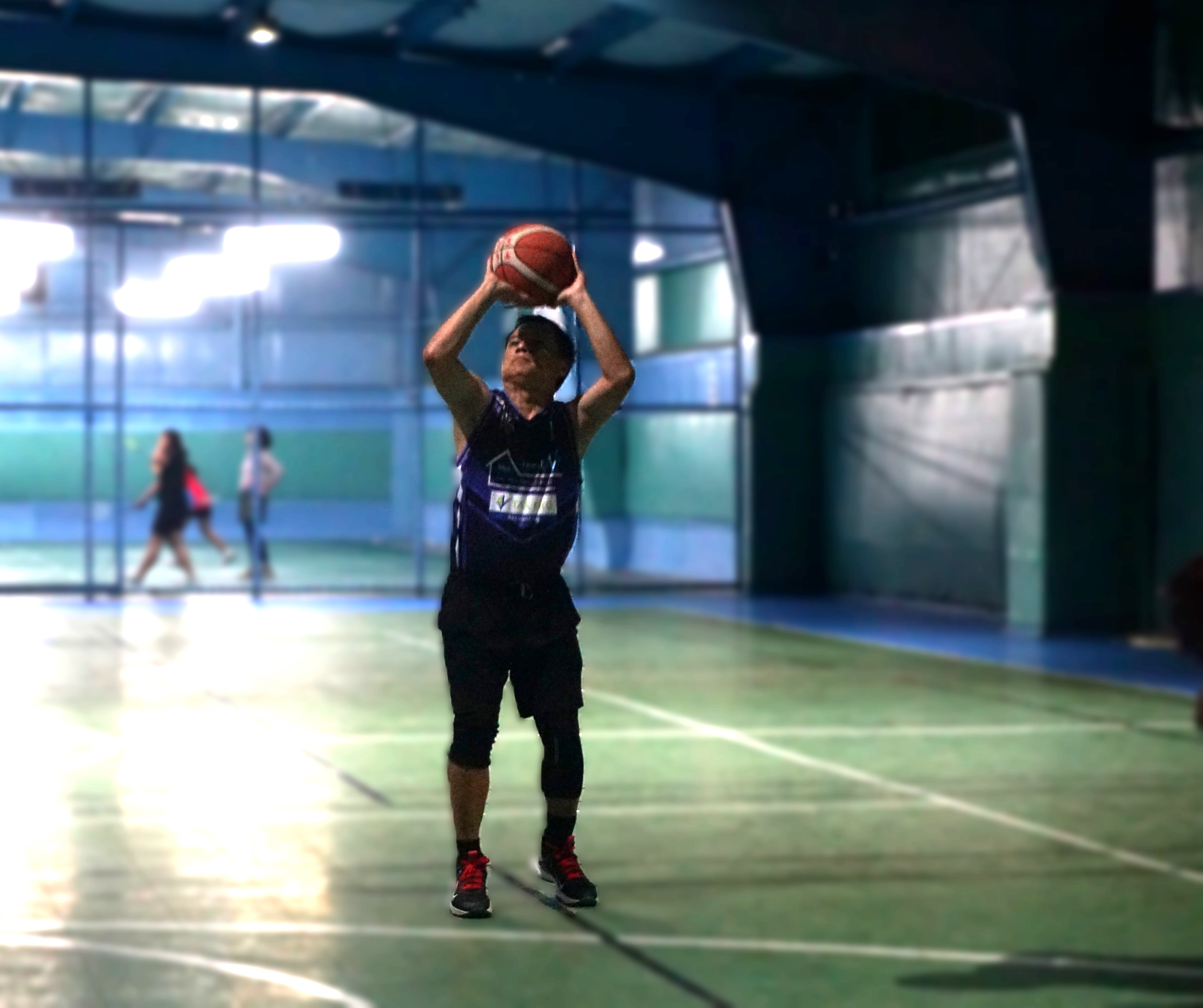 Tax Pro/Triple L's Jener Pineda pulls up for the three-point shot during a game in season 2 of the Legends Sports Association Invitational Basketball League at the TSL Sports Complex.