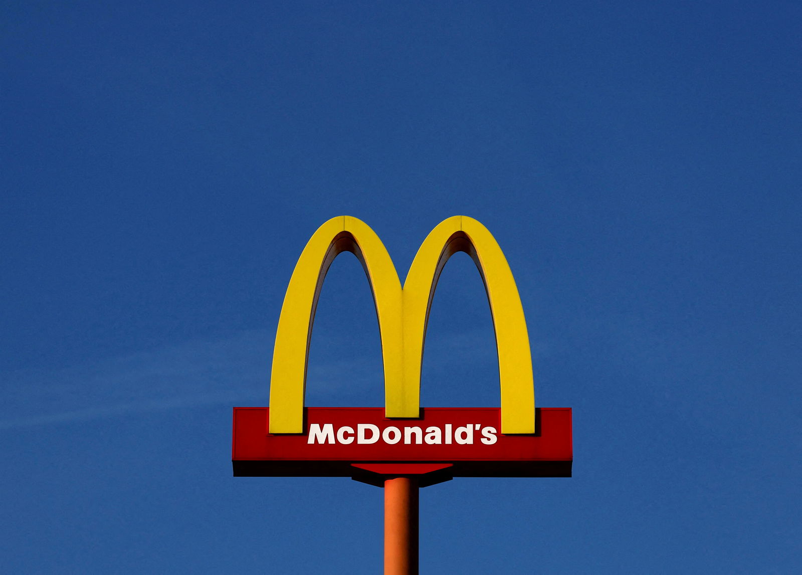 FILE PHOTO: A sign for the U.S. fast food restaurant chain McDonald's is seen outside one of their restaurants in Sint-Pieters-Leeuw, near Brussels, Belgium March 4, 2024. 