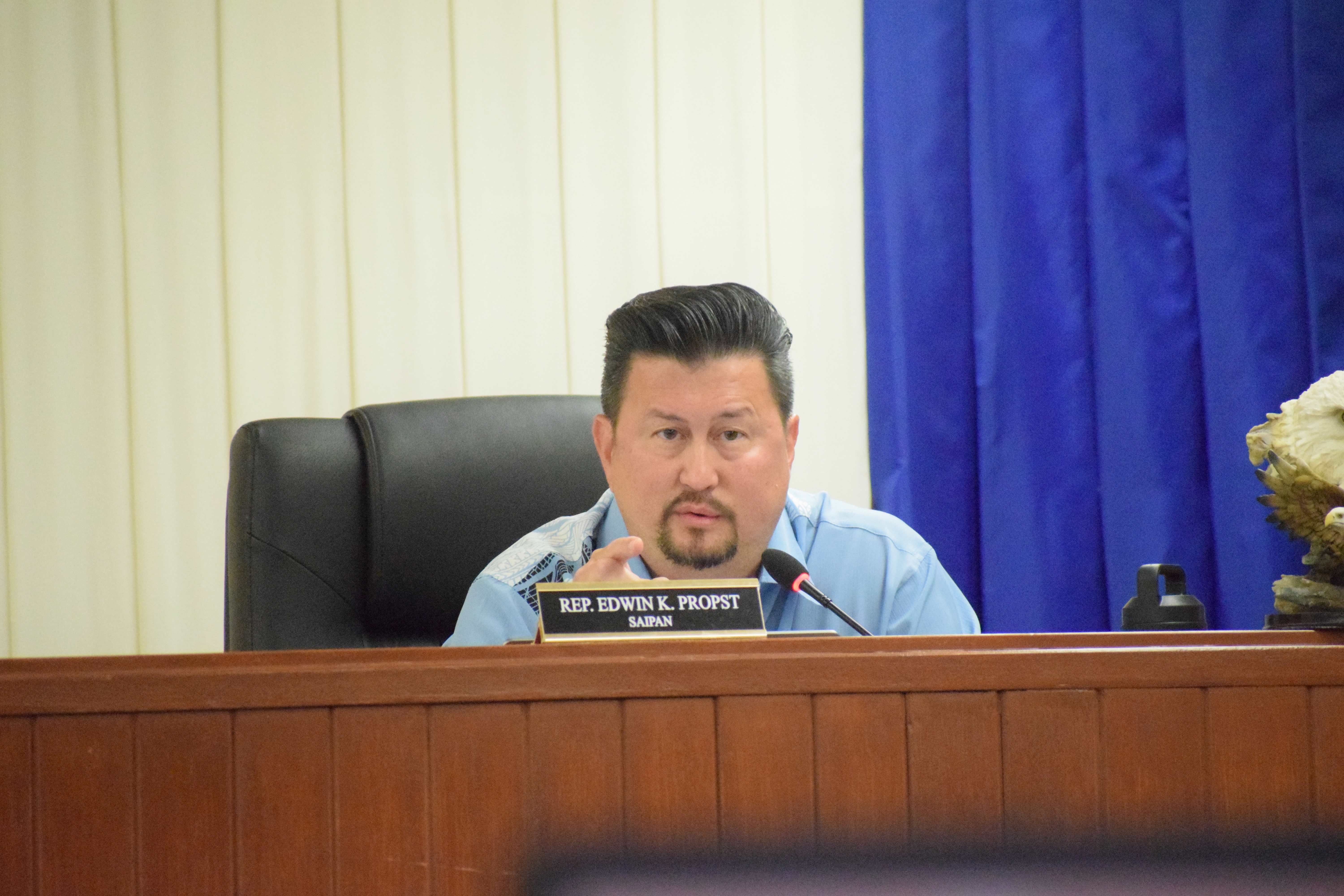 House Floor Leader Edwin Propst asks former Finance Secretary David DLG Atalig — not in photo — a question.