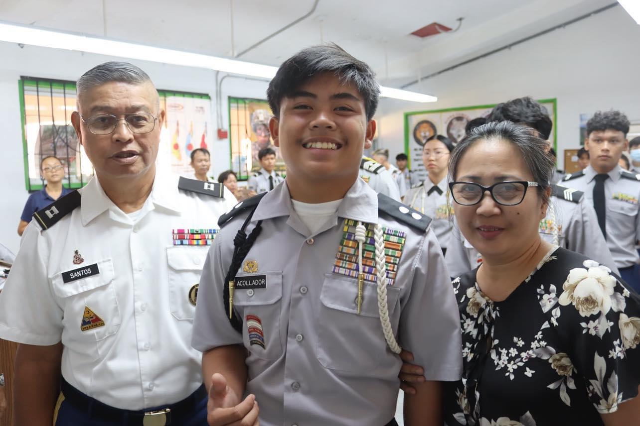 C/CPT Edgard Acollador with his mom and Senior Army Instructor Captain Santos.
