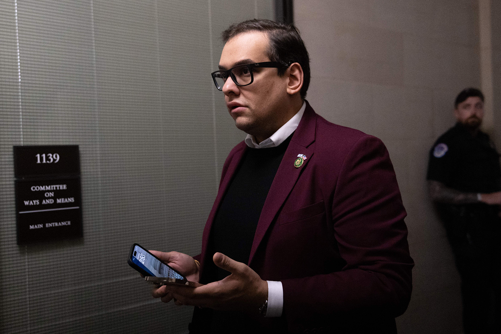 Then-U.S. Rep. George Santos, R-N.Y., arrives to a House Republicans caucus meeting at the Longworth House Office Building on Capitol Hill in Washington, D.C., on Oct. 13, 2023. (Julia Nikhinson/AFP via Getty Images/TNS)