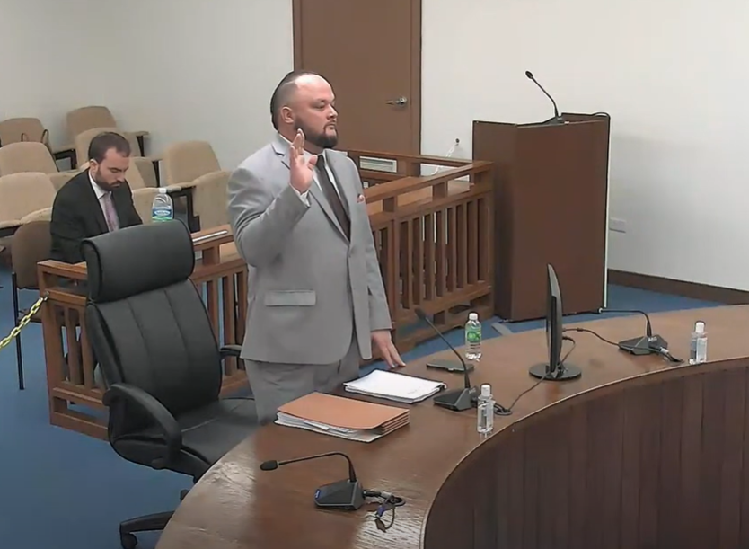 Shayne Villanueva is sworn in by a House special committee during a meeting in the House chamber on March 5, 2024.
