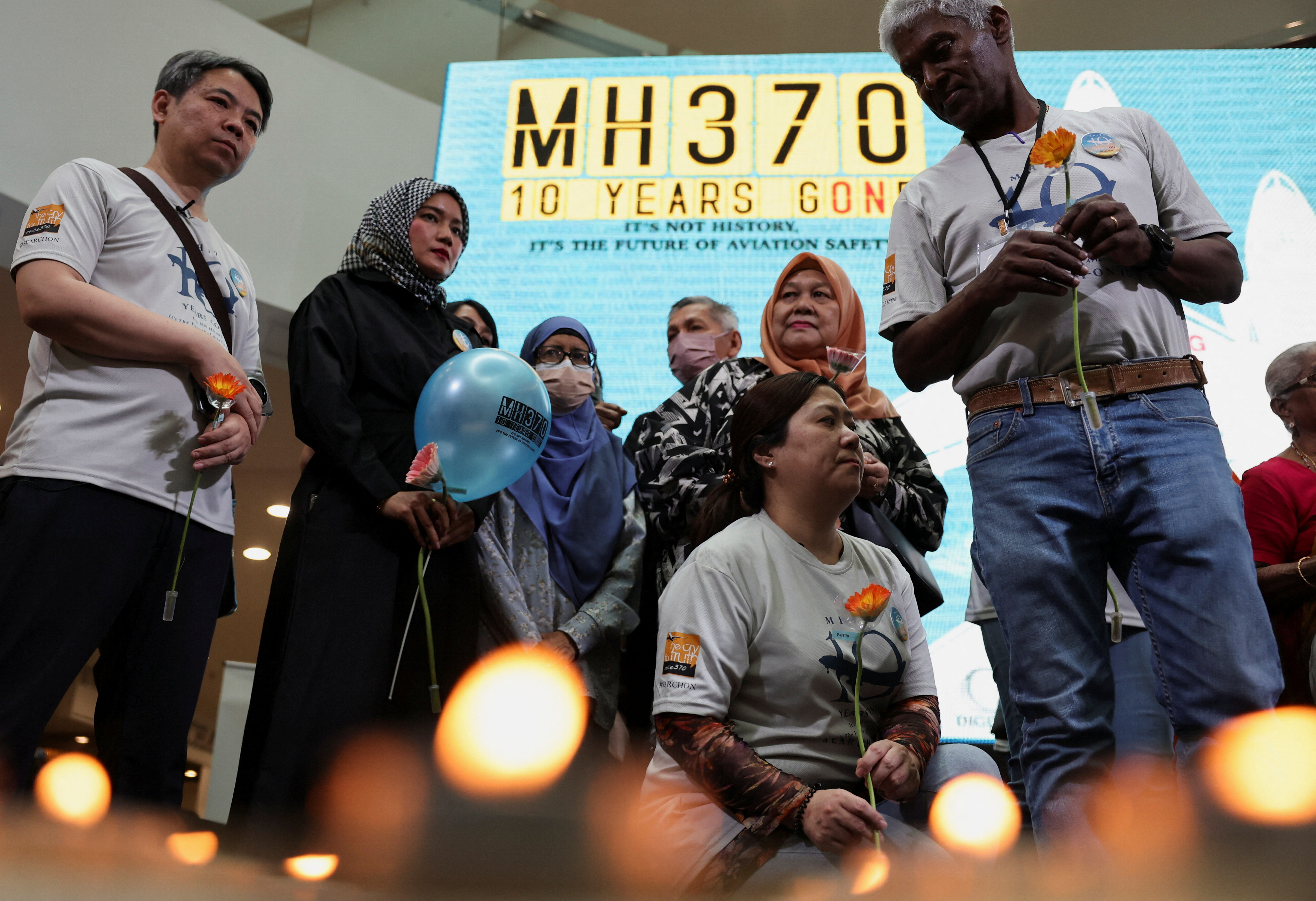Families of passengers from both China and Malaysia, who were aboard the missing Malaysia Airlines flight MH370, are seen during a remembrance event commemorating the 10th anniversary of its disappearance, in Subang Jaya, Malaysia March 3, 2024.