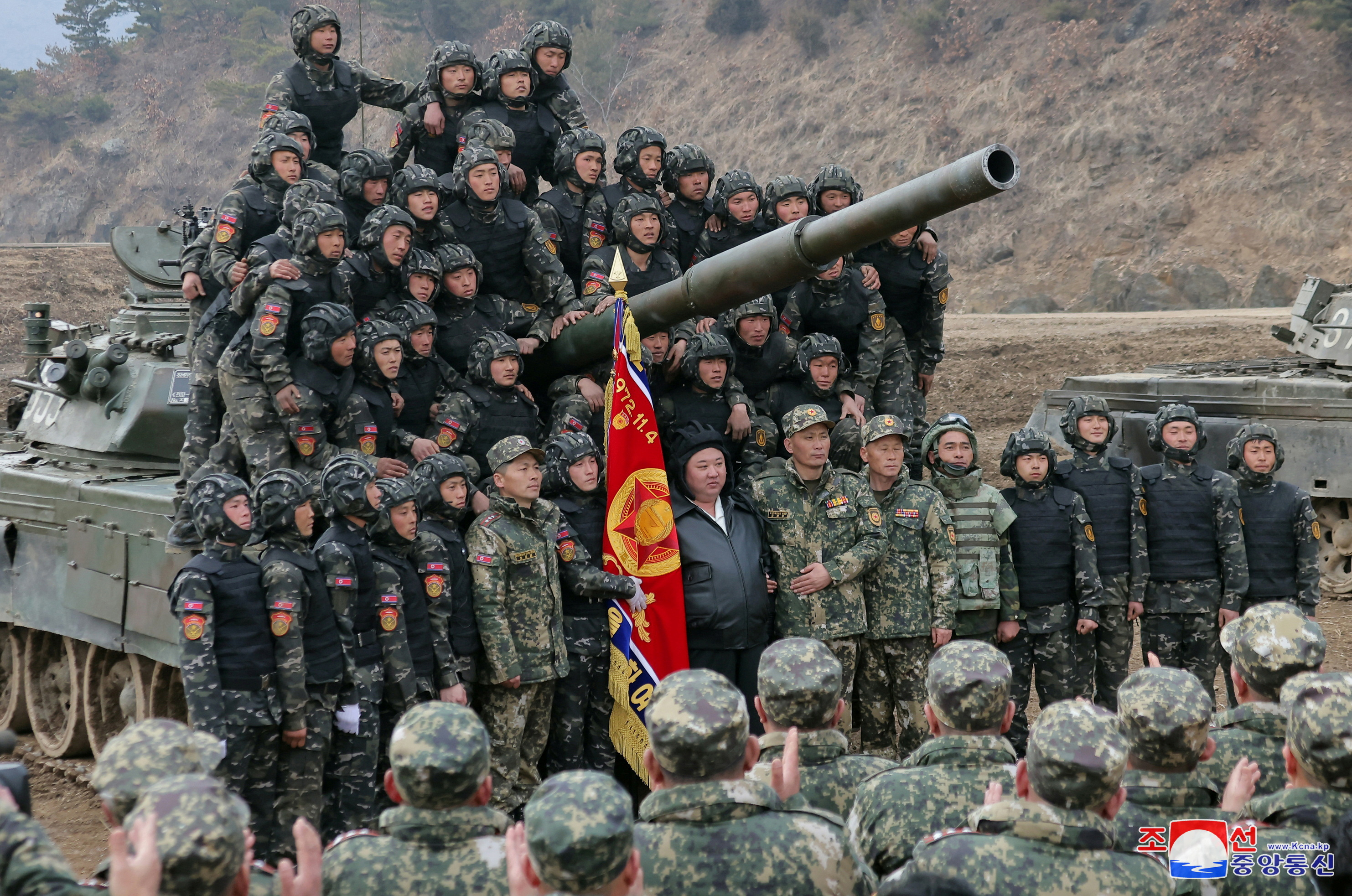 North Korean leader Kim Jong Un poses during a military demonstration involving tank units, in North Korea, March 13, 2024 in this picture released on March 14, 2024, by the Korean Central News Agency. 