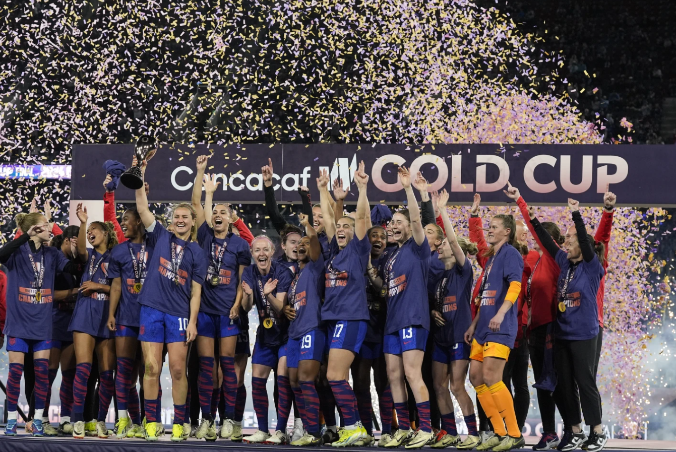 United States Lindsay Horan holds the trophy alongside teammates after they defeated Brazil in the CONCACAF Gold Cup women’s soccer tournament final match, Sunday, March 10, 2024 in San Diego.