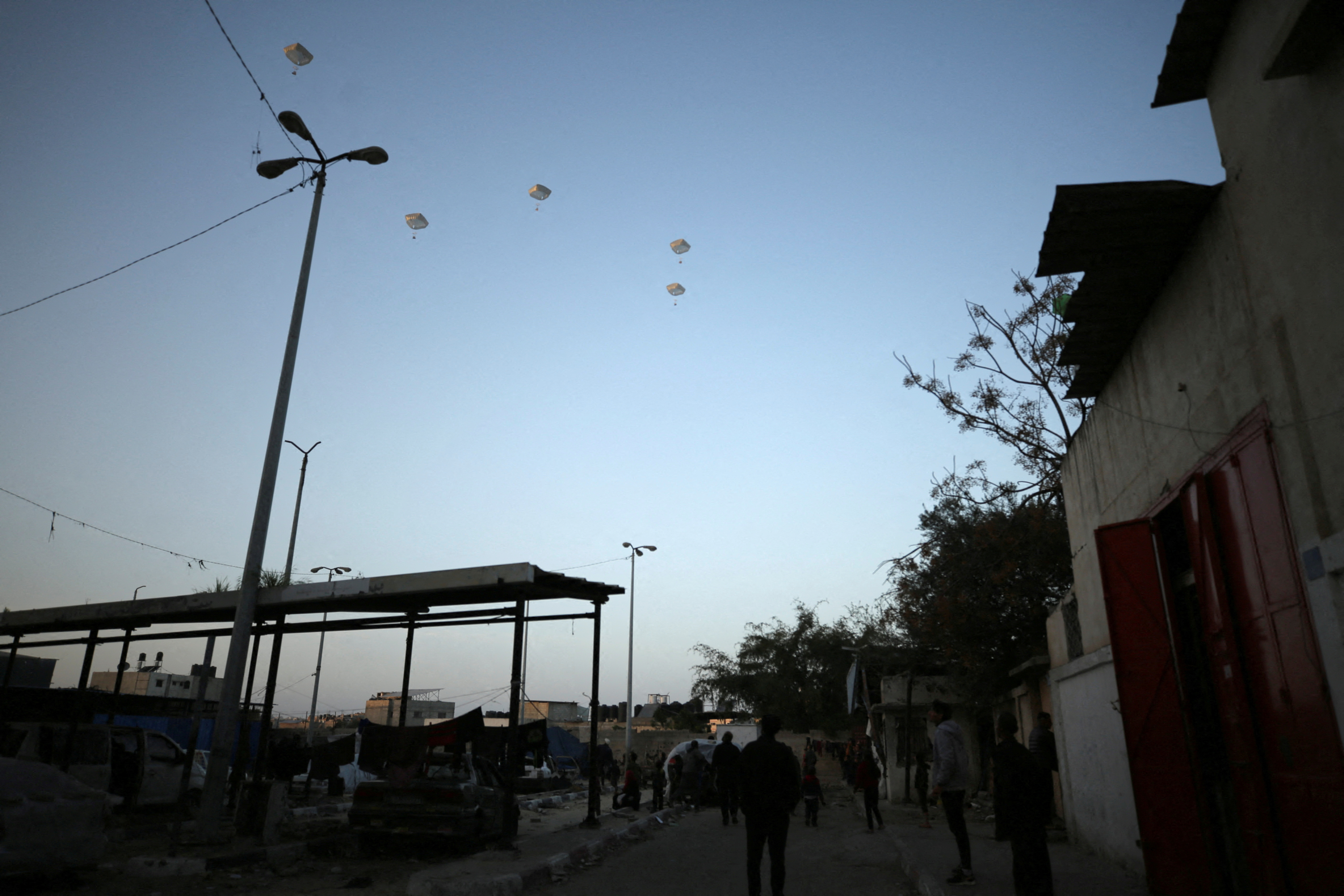 U.S. military carry out its first aid over Gaza, amid the ongoing the conflict between Israel and the Palestinian Islamist group Hamas, in Gaza City, March 2, 2024. 
