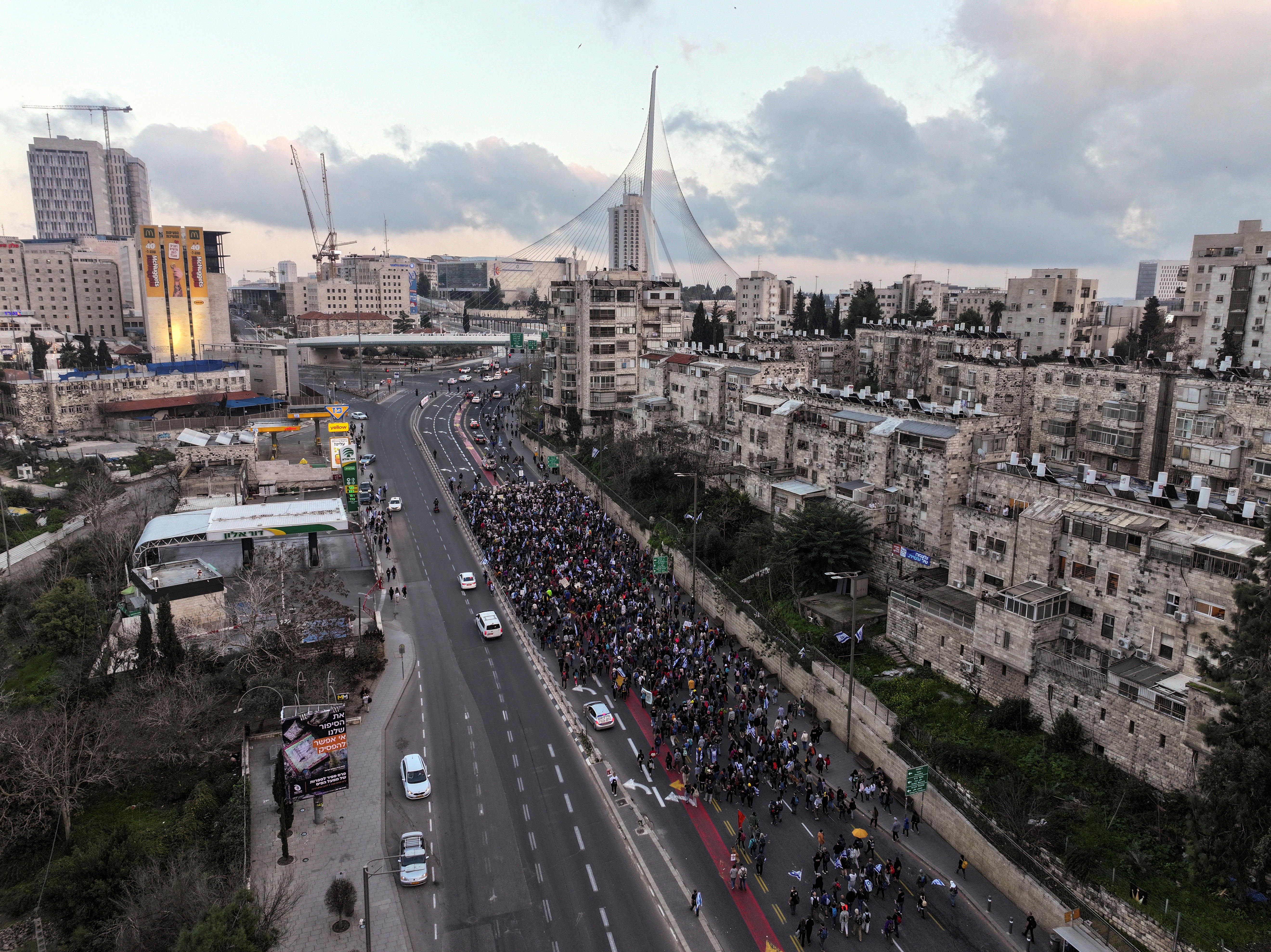 A drone photo shows families and supporters of hostages kidnapped in the deadly October 7 attack on Israel by the Palestinian Islamist group Hamas, as they take part in the four-day march from Reim to Jerusalem as they call for the release of hostages, while entering Jerusalem, Israel, March 2, 2024. 