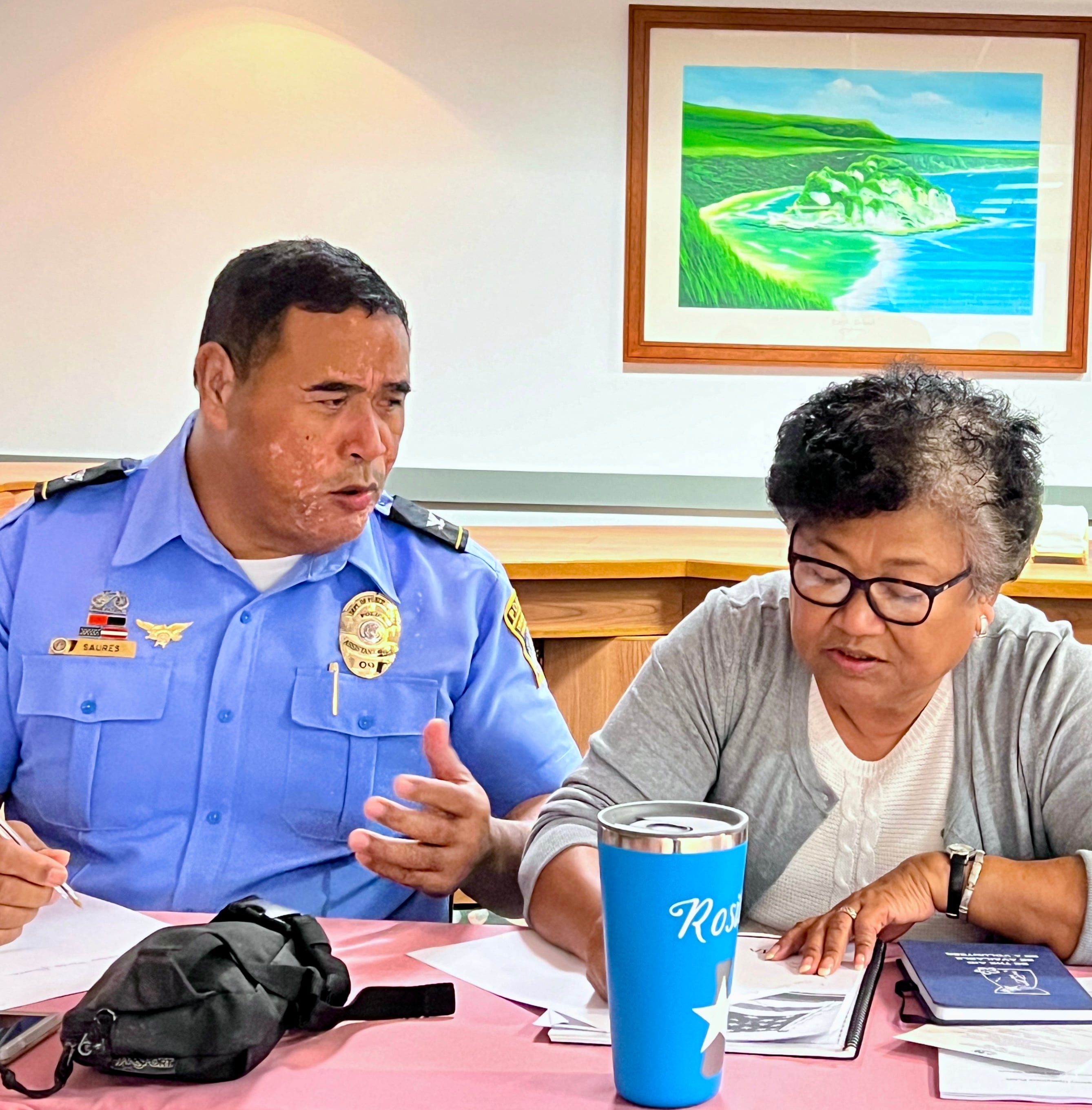 Department of Public Safety Deputy Commissioner Joe Saures with CHCC’s Rosita Sablan Waldron.