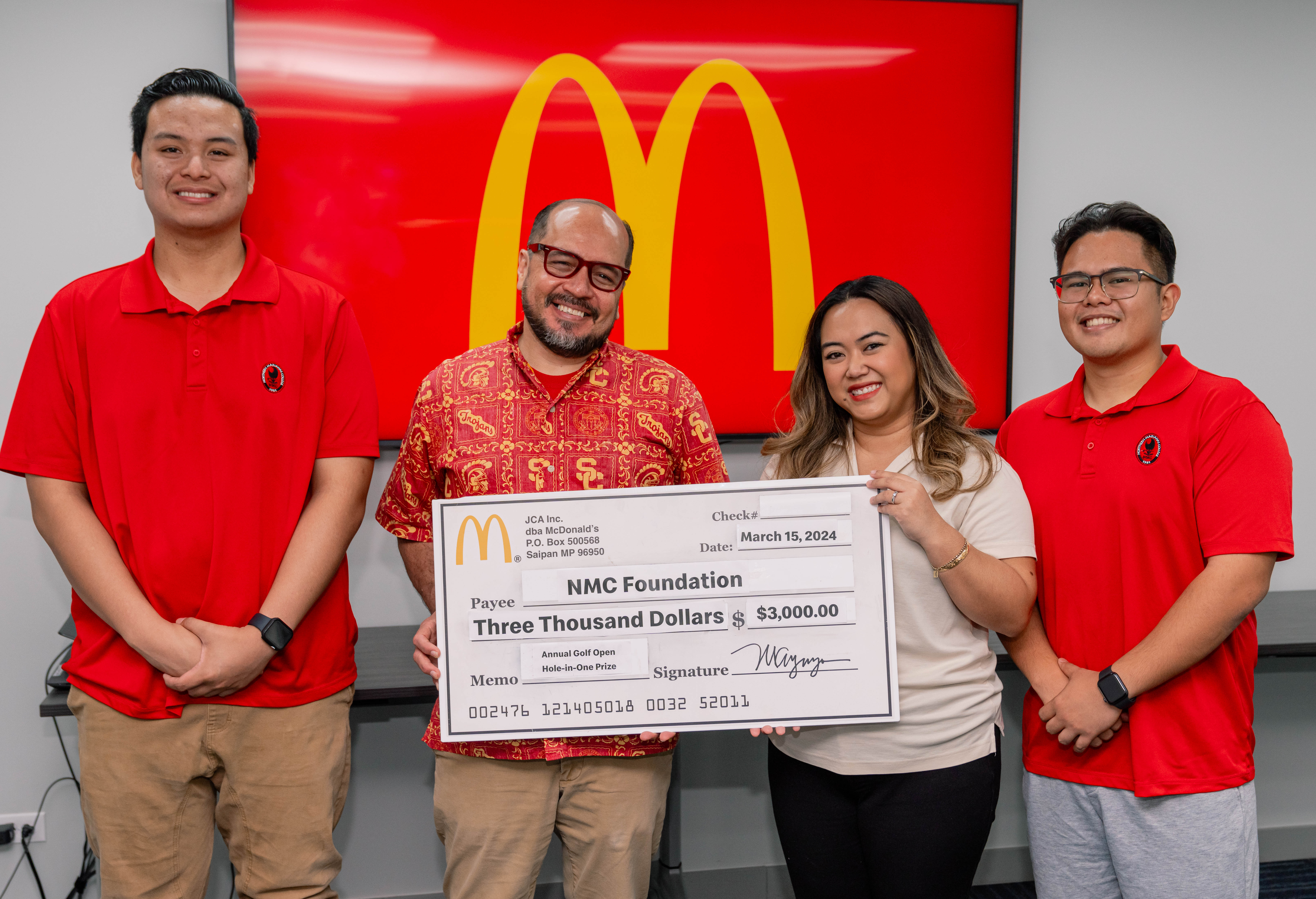 McDonald’s of Saipan will offer a $3,000 hole-in-one cash prize at the Northern Marianas College Foundation Golf Open on March 23 and 24, 2024 at LaoLao Bay Golf and Resort. In photo from left are NMC student Richard Baleares, NMC President Galvin Deleon Guerrero, EdD, Executive Assistant to the President for McDonald's of Guam and Saipan Mable Ayuyu Glenn, and NMC Content Creator/Digital Media Specialist Casey Huliganga.