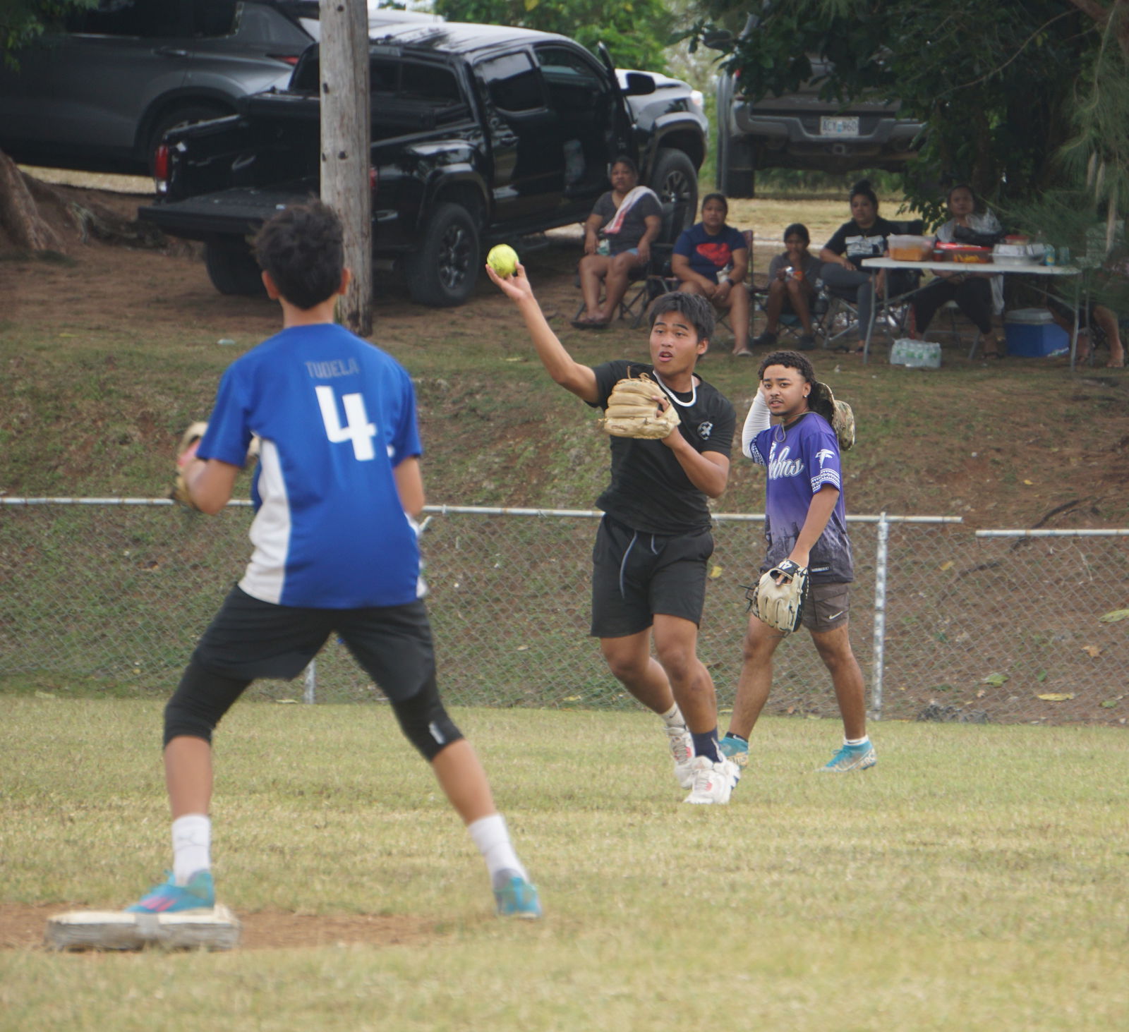 Sweet Rolls shortstop Achilles Evangelista, throws to second baseman MJ Tudela for the out during a game of the 2024 Mayor’s Youth Softball Cup at the Capital Hill baseball field on Sunday.