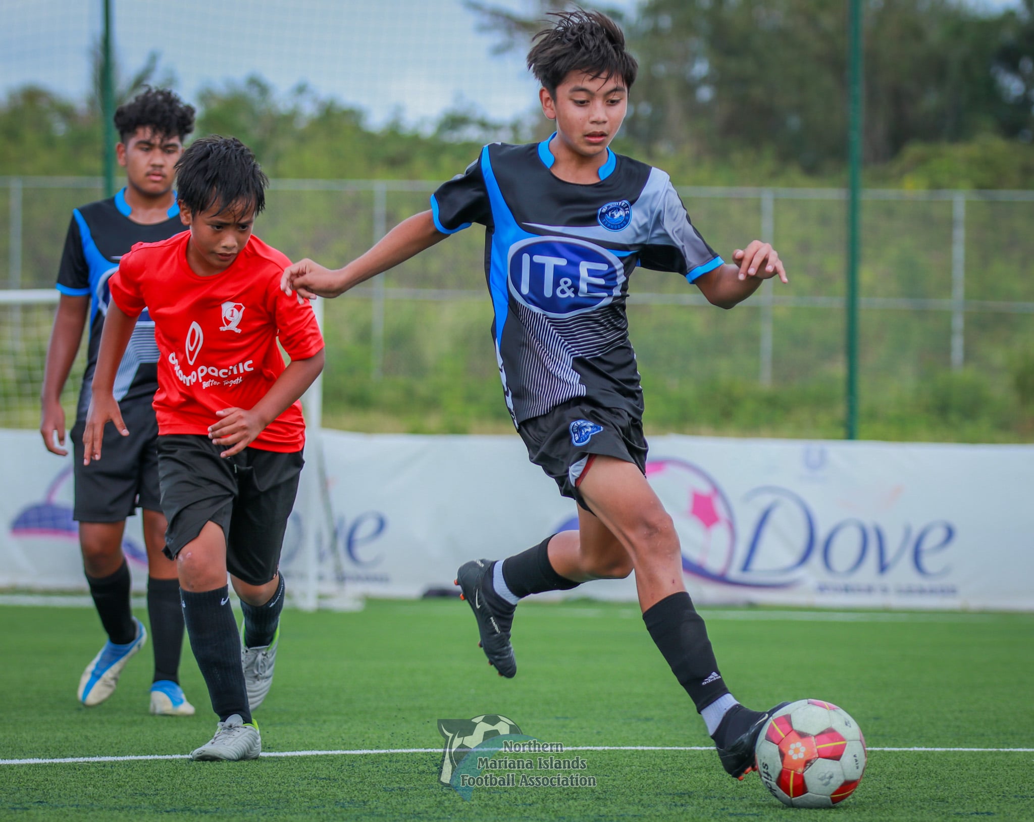 MP United Football Club's Izeiah Deleon Guerrero in action against Paire Football Club in the U14 boys division of the 2024 TakeCare Youth Soccer League at the NMI Soccer Training Center in Koblerville on Saturday.