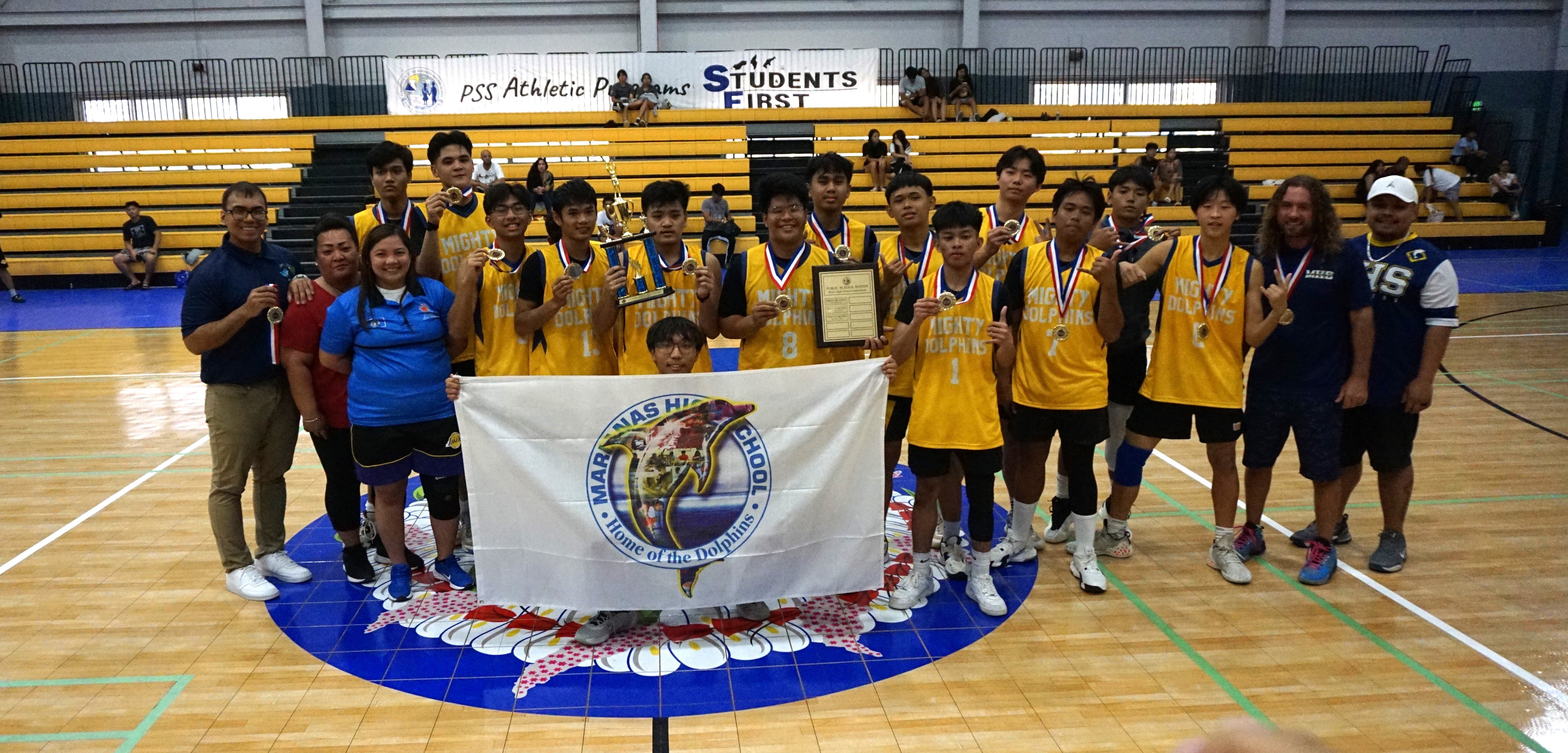 The MHS team members pose with the championship trophy of the IT&E Interscholastic Basketball League SY23-24 at the Ada gym on Saturday.  