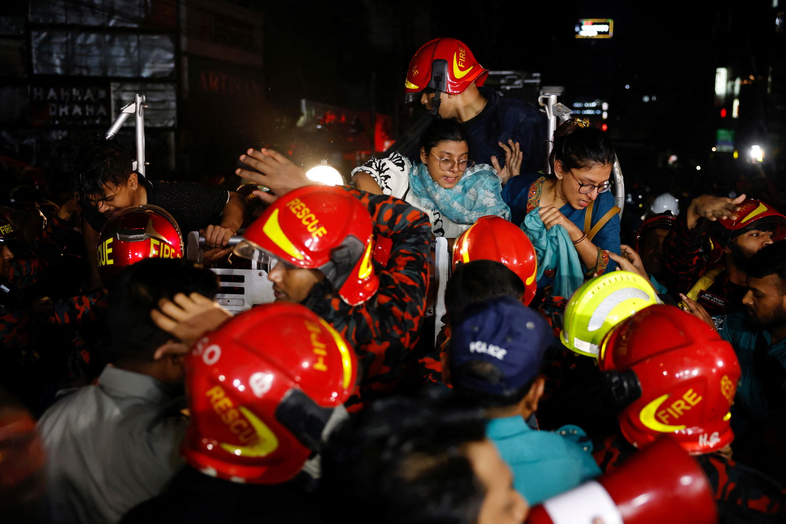 Firefighters operate after a fire broke out in a multi-storey building in Dhaka, Bangladesh, February 29, 2024. 