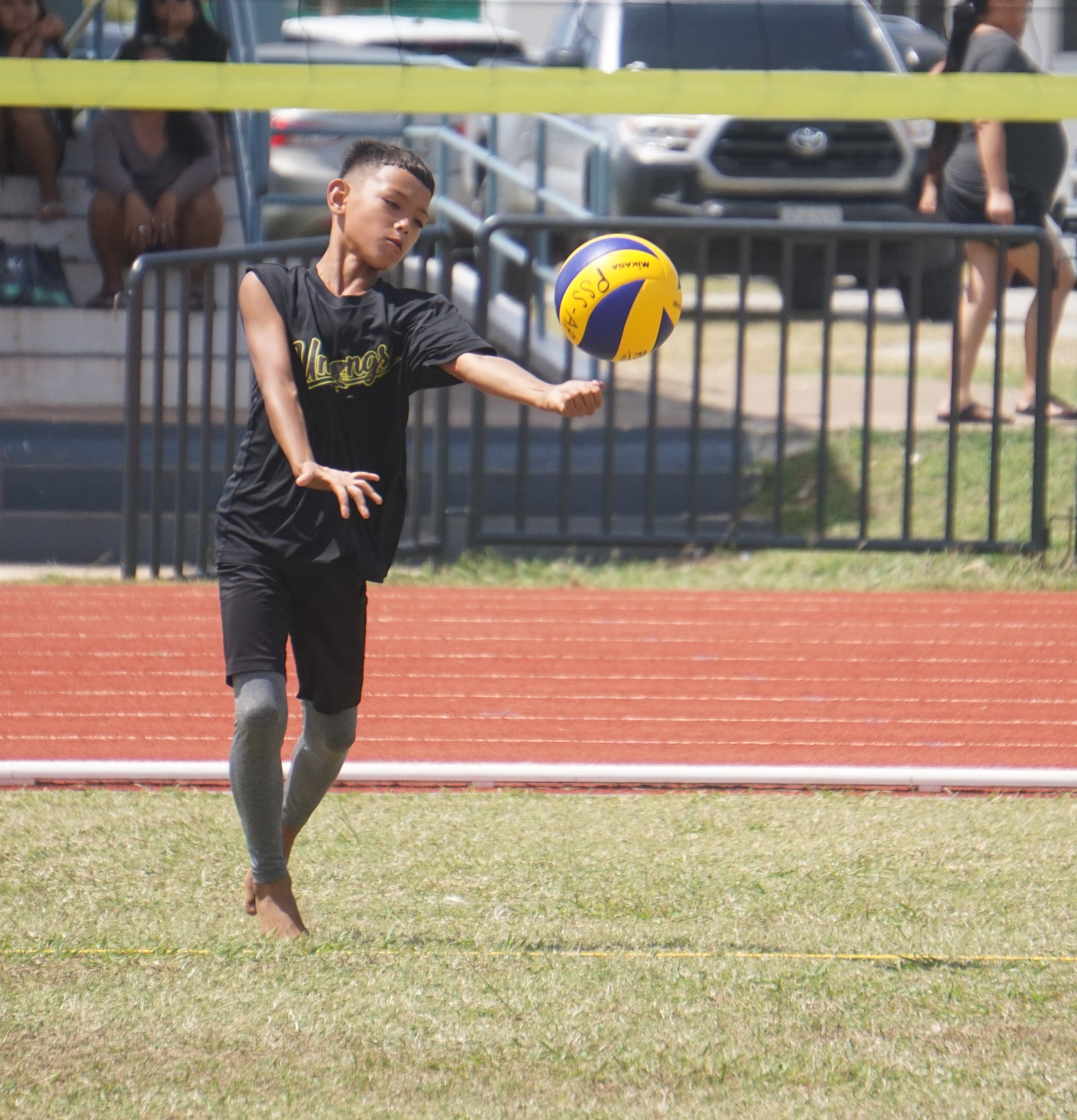 A Koblerville Elementary School student connects the underhand serve against Kagman Elementary School during the championship game in the co-ed elementary school division of the NMIVA-PSS Interscholastic Volleyball League SY23-24 at the Oleai Sports Complex on Saturday. 