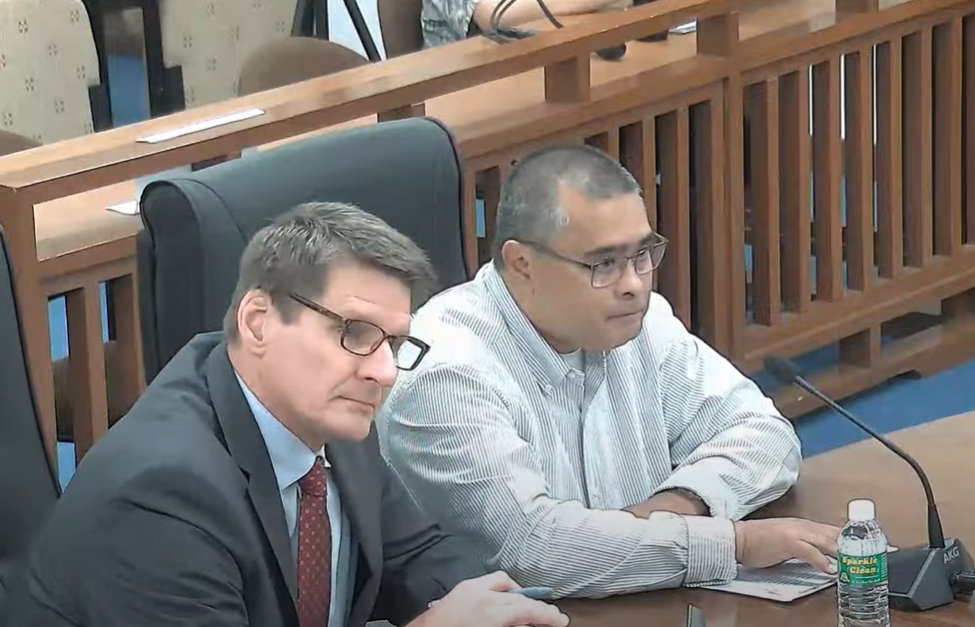 Former Finance Secretary David DLG Atalig, right, with his lawyer, Bruce Berline.
