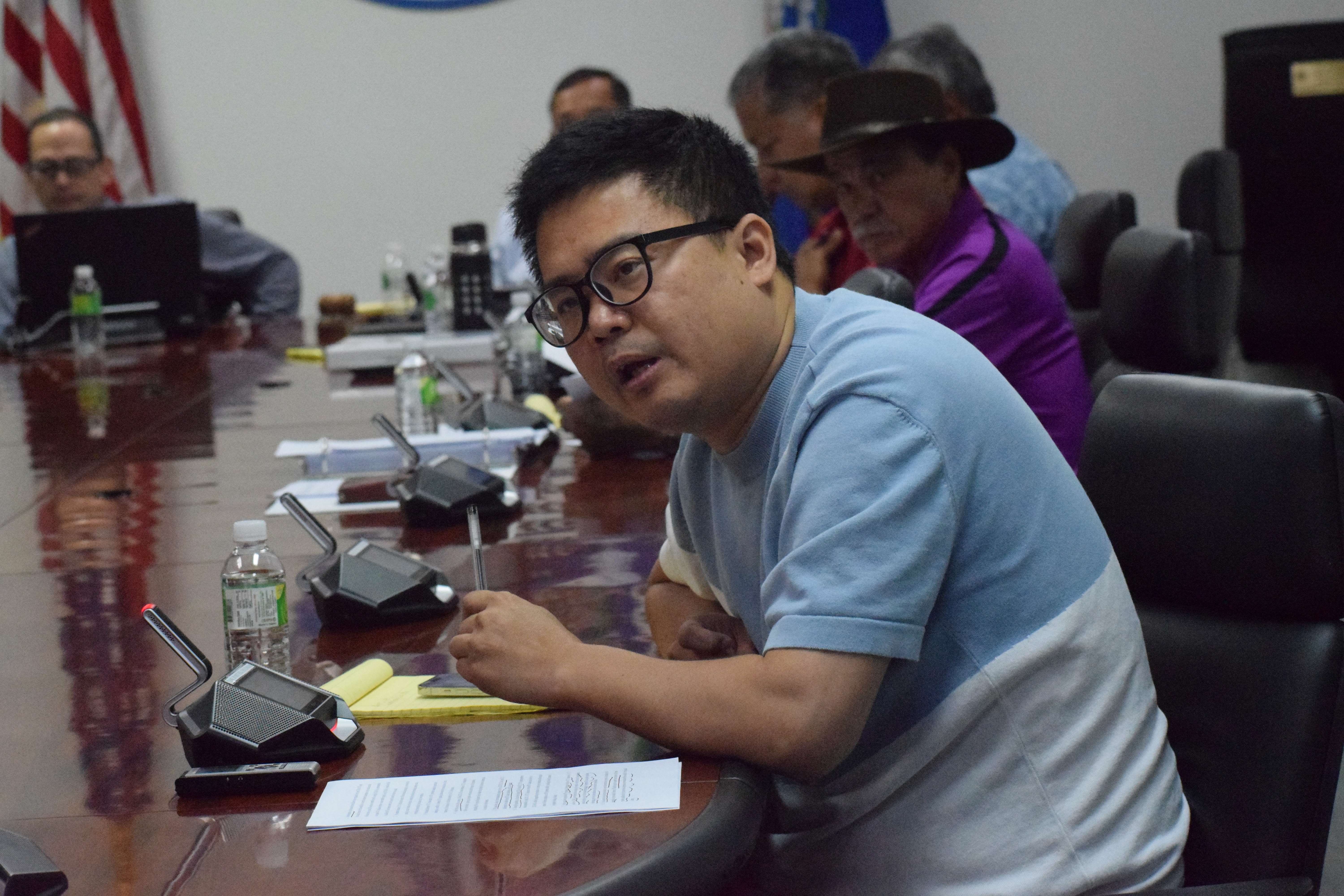 Imperial Pacific International Director How Yo Chi speaks during the revocation hearing on Friday at the administration building on Capital Hill.