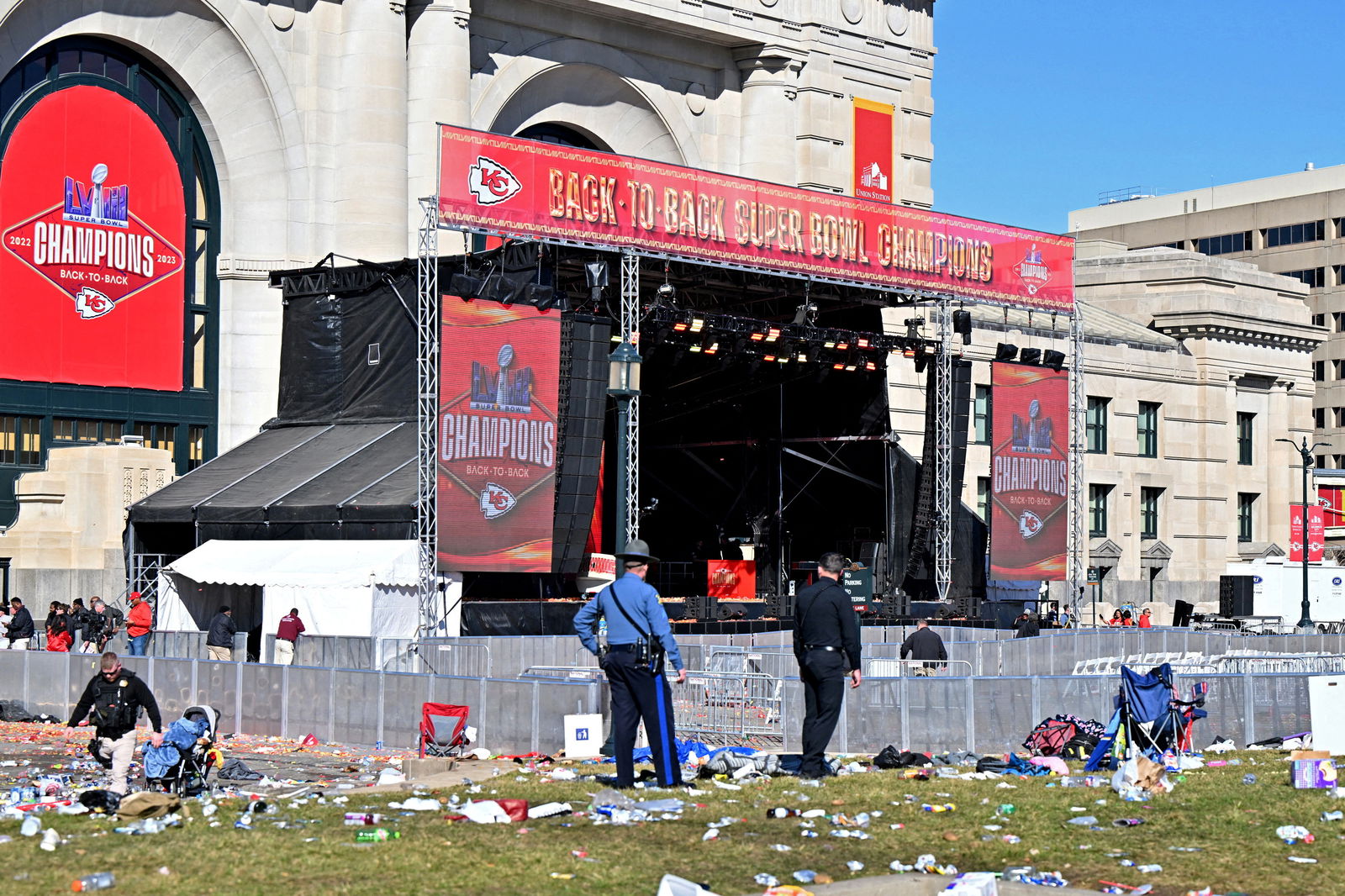 FILE PHOTO: Feb 14, 2024; Kansas City, MO, USA; Police clear the area after shots were fired after the celebration of the Kansas City Chiefs winning Super Bowl LVIII. 
