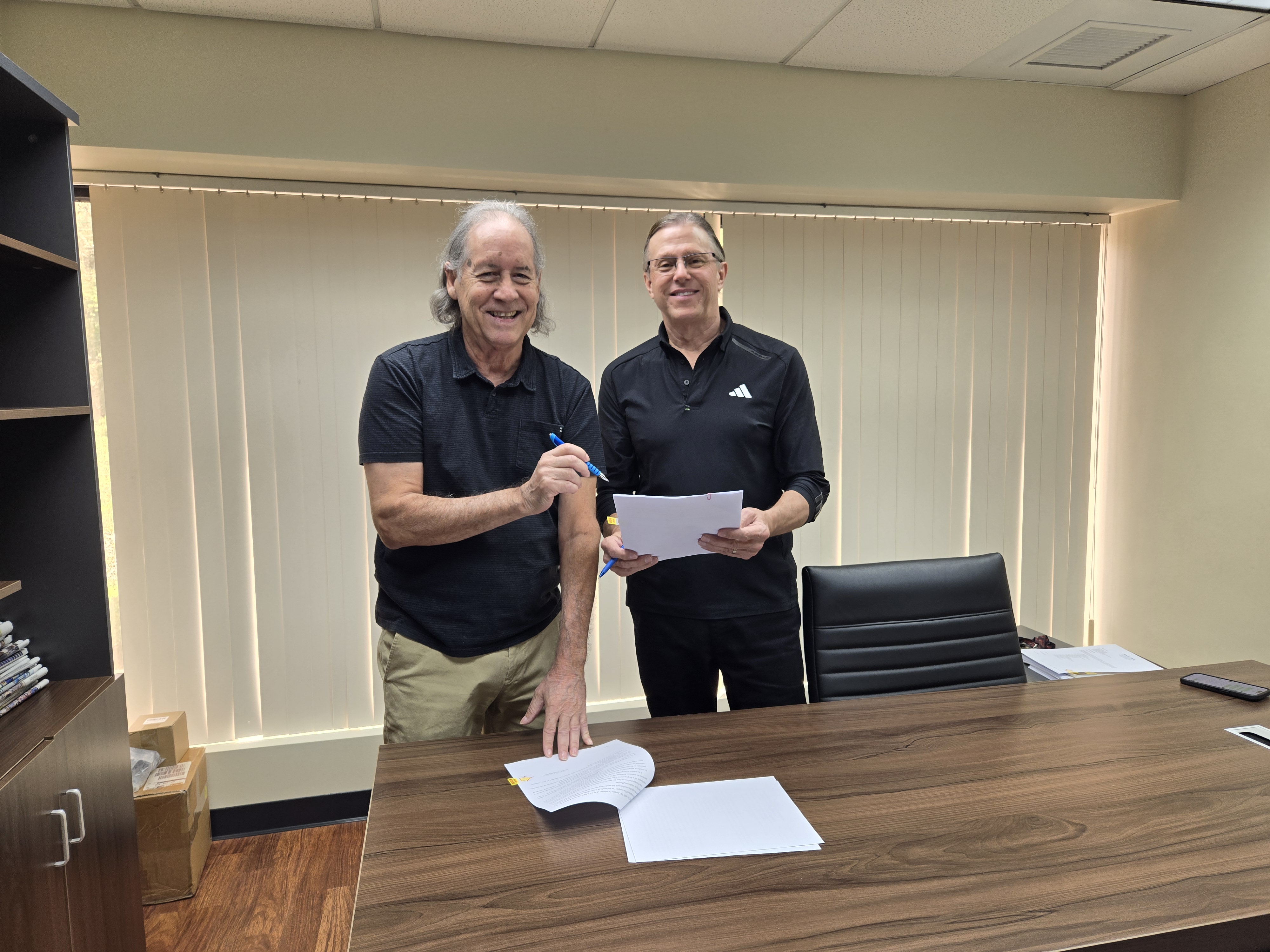 DB Media's David Hood, right, and Bob Webb are the new owners of KZMI 103.9 FM and Power 99 FM.