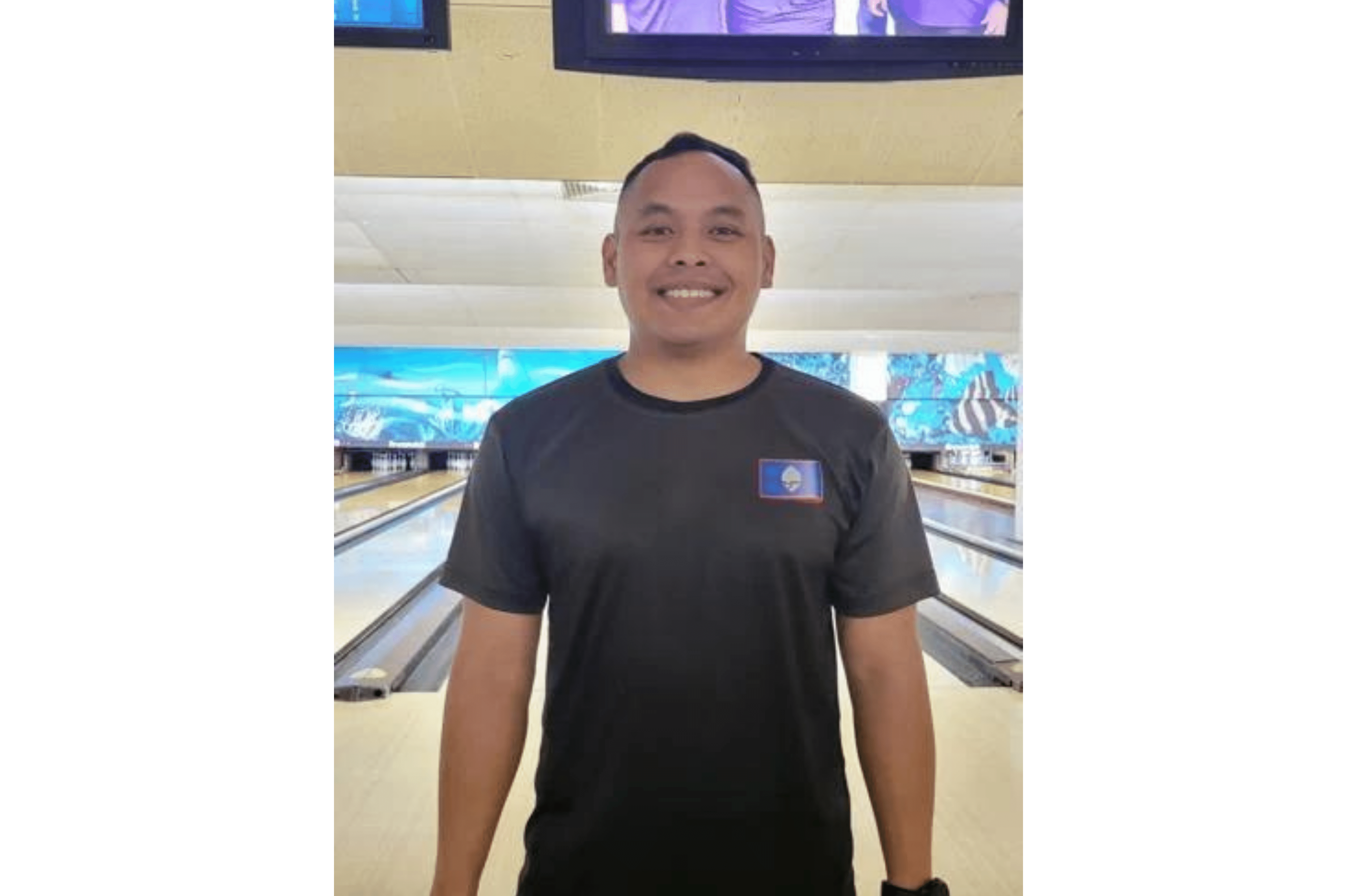 Ray San Nicolas is all smiles after clinching this month's Budweiser King of the Lanes bowling title Sunday, March 17, 2024. 