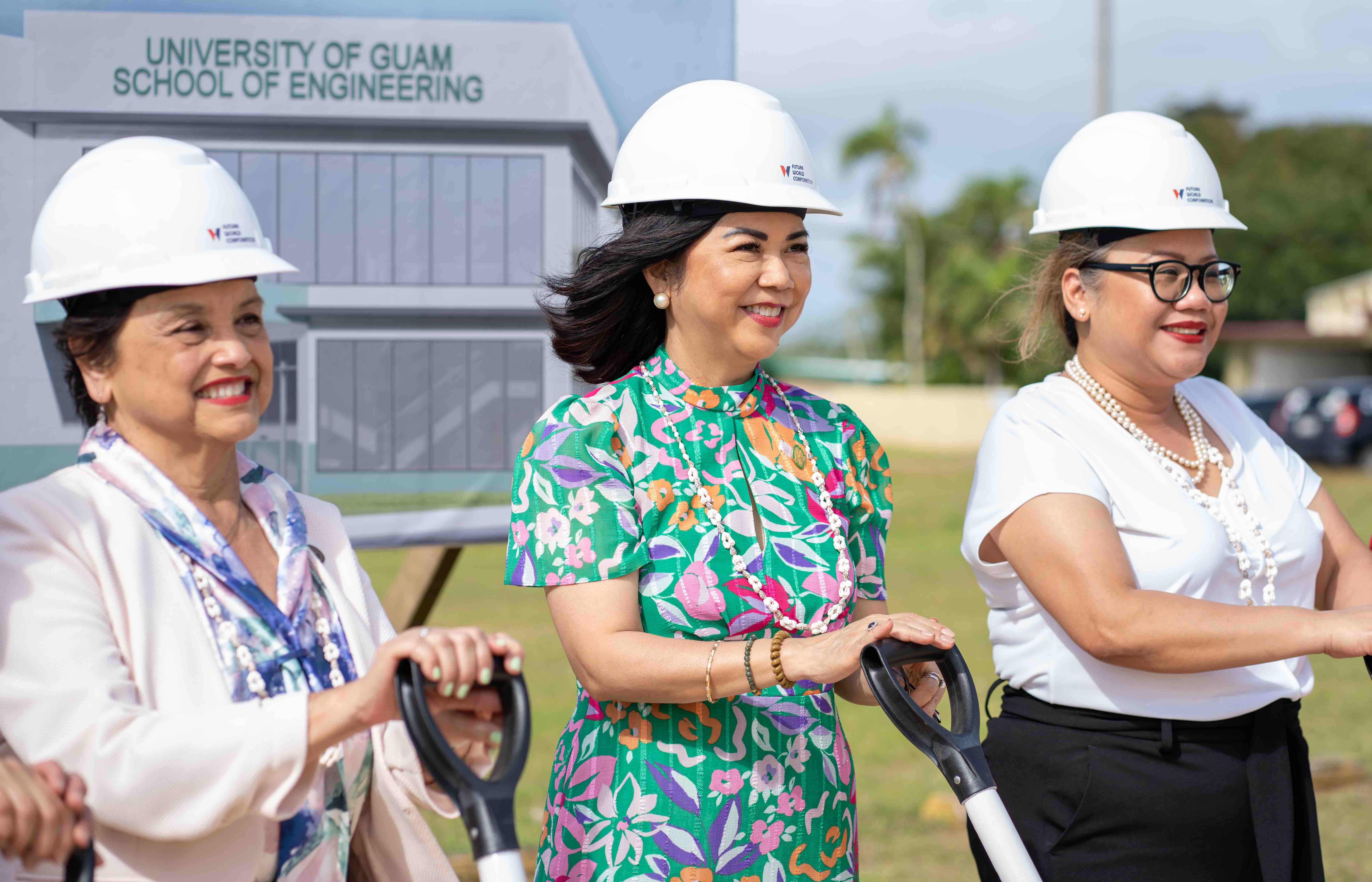University of Guam President Anita Borja Enriquez, center, is joined by Gov. Lou Leon Guerrero, left, and UOG Senior Vice President and Provost Sharleen Santos-Bamba at the groundbreaking ceremony for the School of Engineering building at UOG on Dec. 15, 2023.