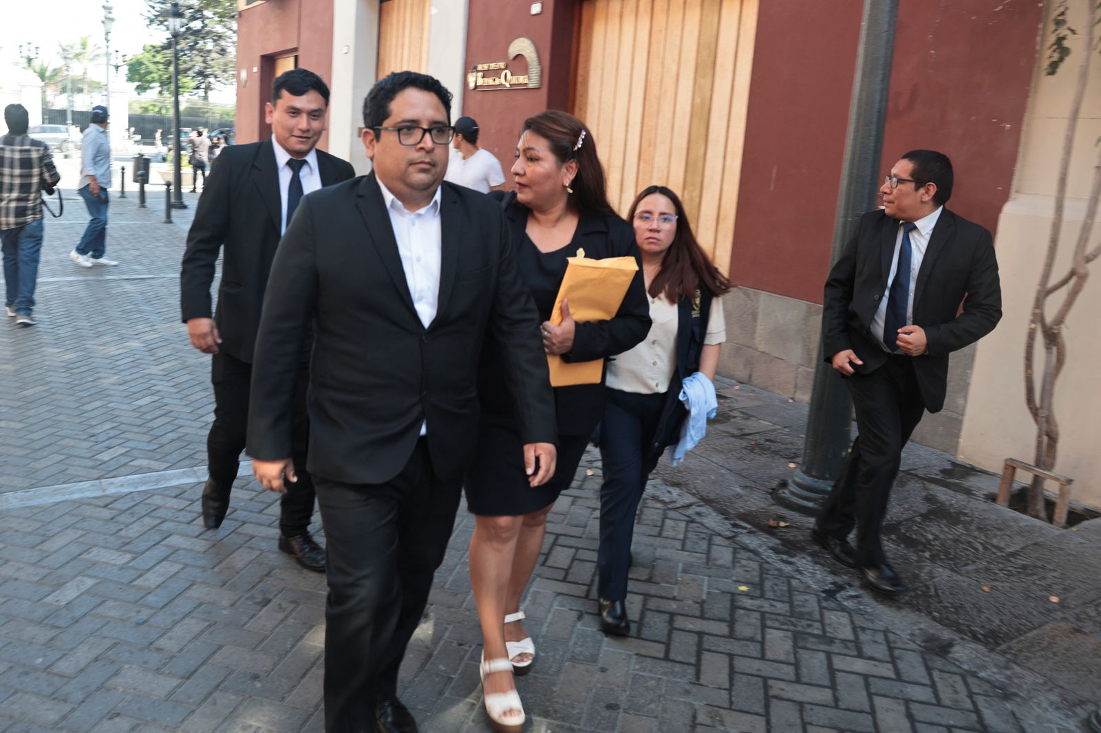 Prosecutors leave the Government Palace as part of inquiries against Peru's President Dina Boluarte into possible illicit enrichment and failure to declare ownership of luxury watches, in Lima, Peru March 30, 2024.