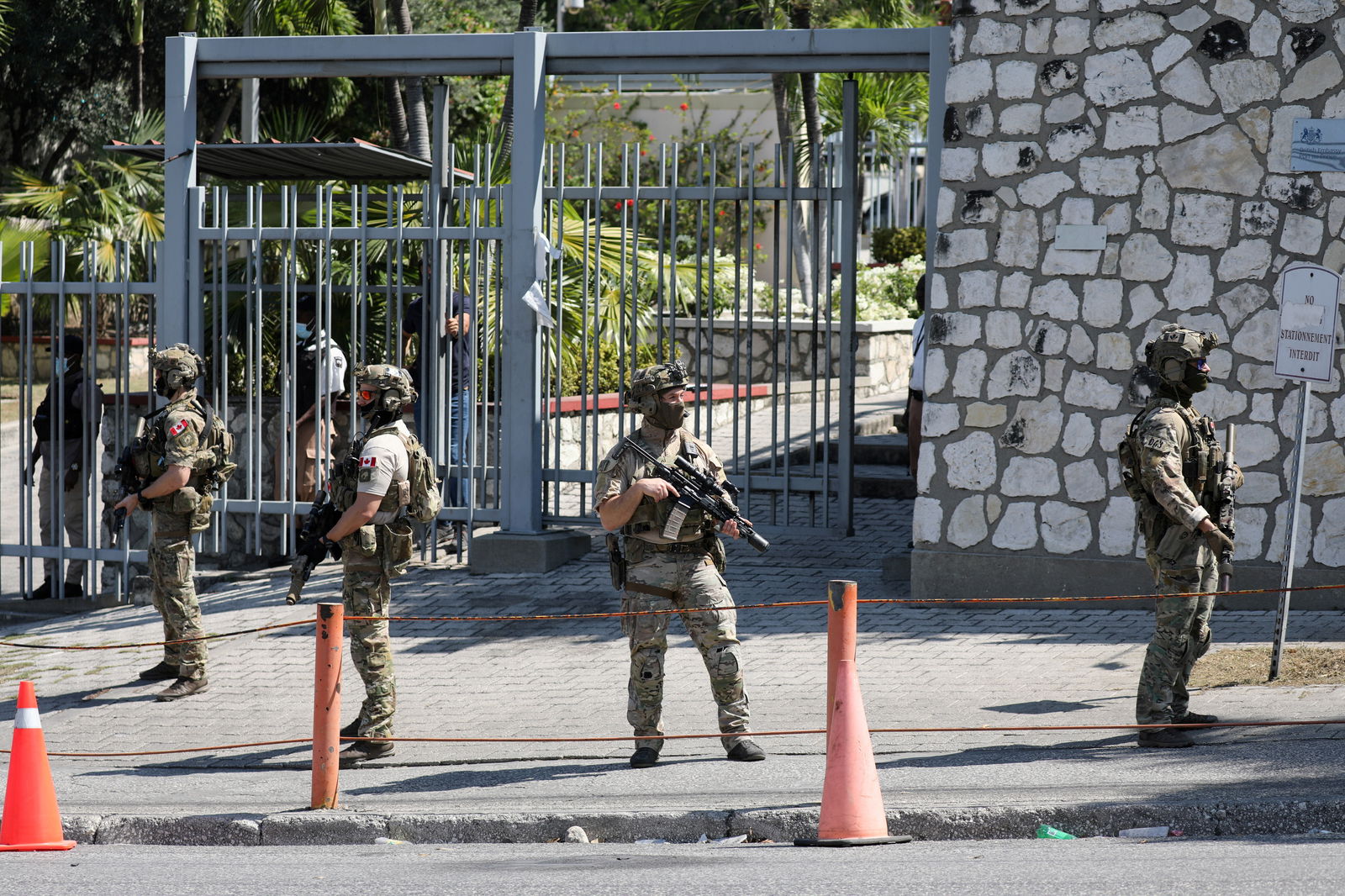 FILE PHOTO: Canadian soldiers stand guard by the Canadian embassy as violence spreads and armed gangs expand their control over the capital, in Port-au-Prince, Haiti March 29, 2024. 