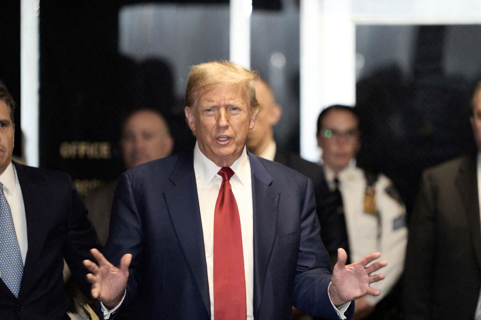FILE PHOTO: Former U.S. President Donald Trump leaves Manhattan Criminal court after a hearing in the upcoming hush money trial, in New York City, U.S., March 25, 2024. 