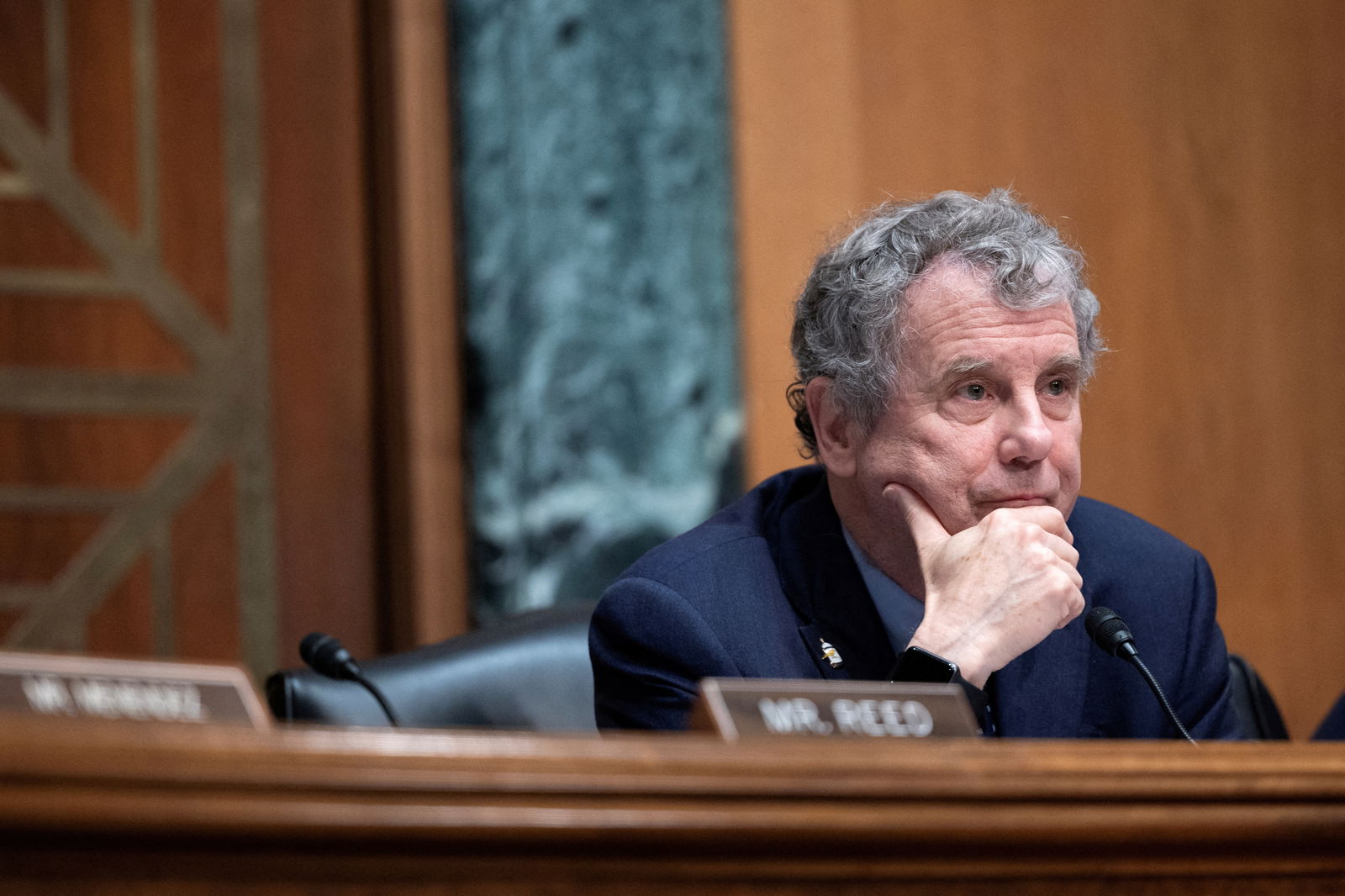 FILE PHOTO: Senate Banking Committee Chair Senator Sherrod Brown (D-OH) listens to testimony during a hearing on Capitol Hill in Washington, U.S., March 7, 2024. 