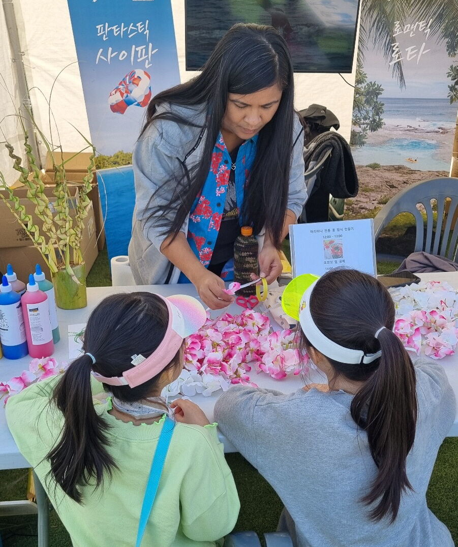 Edrina Rabauliman teaches mwar-making as the Marianas Visitors Authority promotes the Marianas at Yeouido Spring Flower Festival in Seoul, South Korea, on March 29-April 2, 2024.