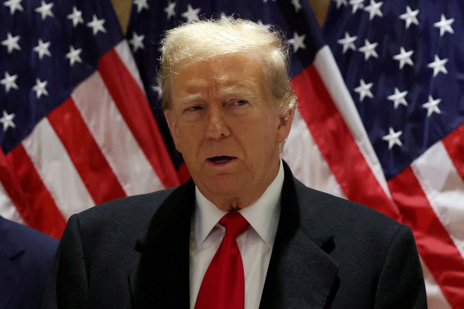 FILE PHOTO: Republican presidential candidate and former U.S. President Donald Trump speaks during a press conference at one of his properties after attending a hearing in his criminal court case on charges stemming from hush money paid to a porn star in New York City, U.S., March 25, 2024. 