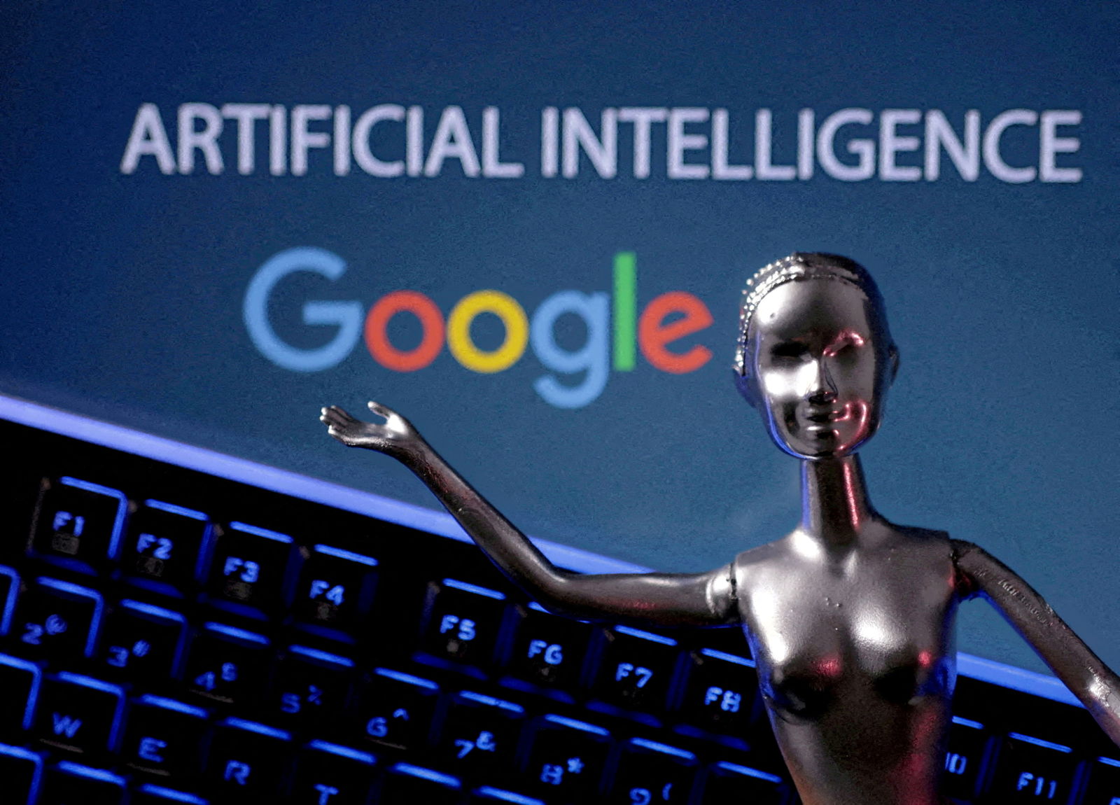 FILE PHOTO: Google logo and AI Artificial Intelligence words are seen in this illustration taken, May 4, 2023. 