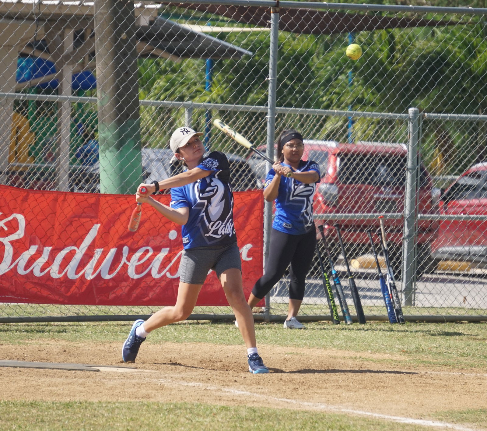 Lady Blue Jays’ Kiana Camacho is about to hit a single during a ladies division game of the 2024 Budweiser Belau Amateur Softball Association League at the Dandan baseball field.