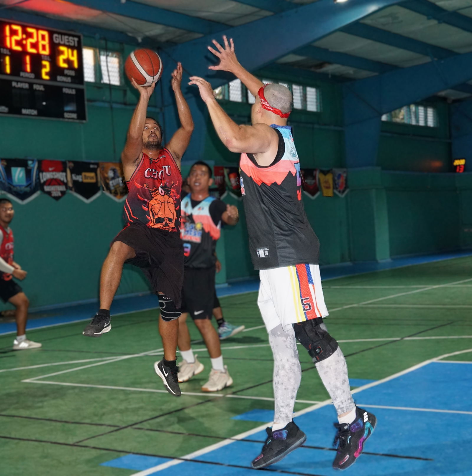 Choju's Tom Pangelinan takes the off-balanced shot during a playoff game against Lamesa Kusina in season 2 of the Legends Sports Association Invitational Basketball League at the TSL Sports Complex on Saturday night.