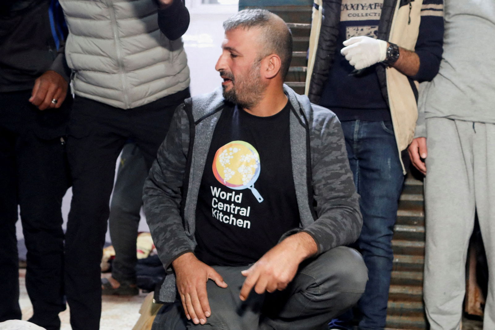 A mourner reacts next to the bodies of employees from the World Central Kitchen (WCK) non-governmental organization, including foreigners, who were killed in an Israeli airstrike according to the Hamas-run Gaza government media office but the Israeli military said it was conducting a thorough review at the highest levels to understand the circumstances of this "tragic" incident, at Al-Aqsa hospital in Deir Al-Balah, in the central Gaza Strip April 1, 2024. 