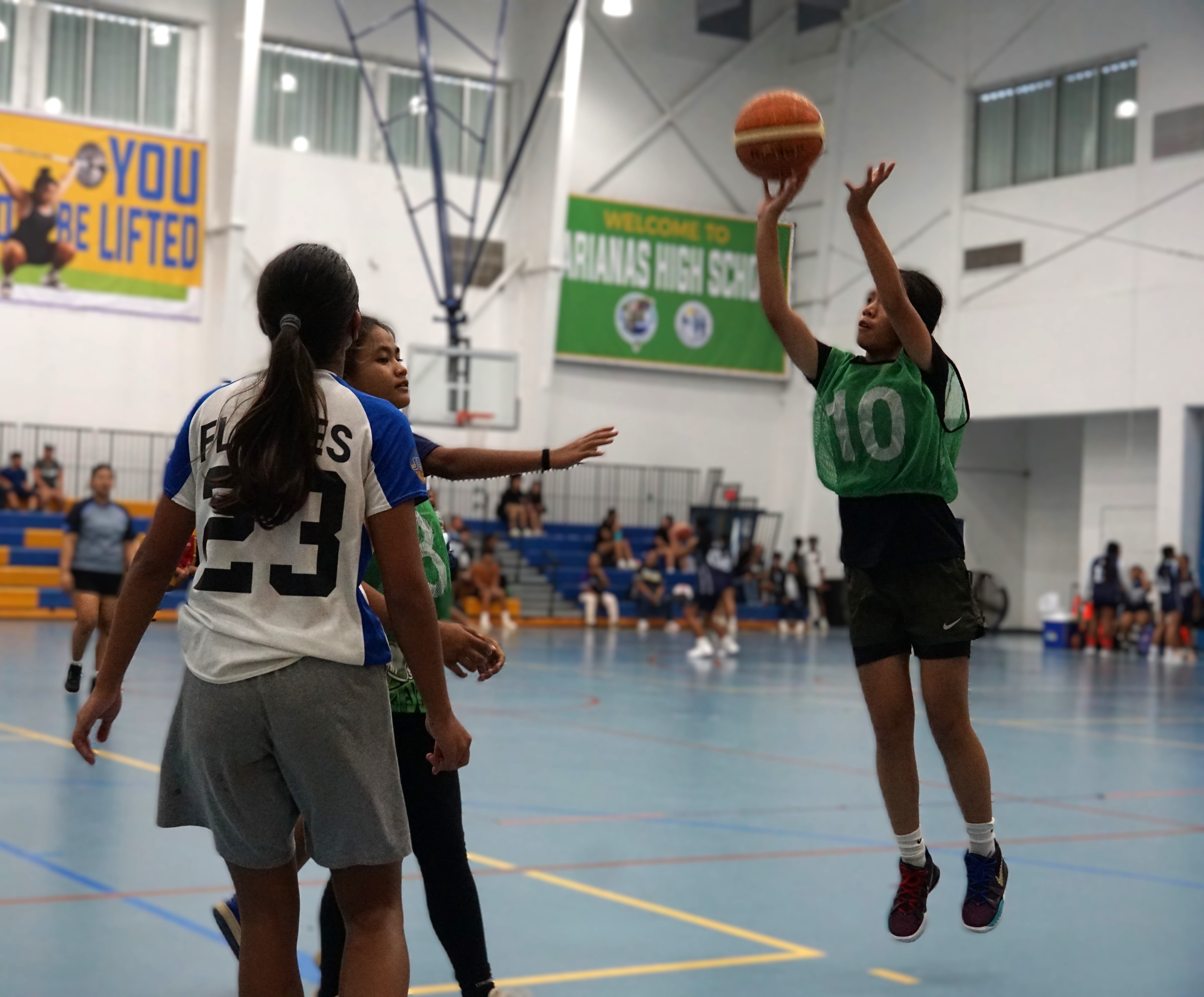 Hopwood’s Maria Enriquez pulls up for the perimeter shot during a girls middle school division game of the IT&E Interscholastic Basketball League SY23-24 at the MHS gym on Wednesday.