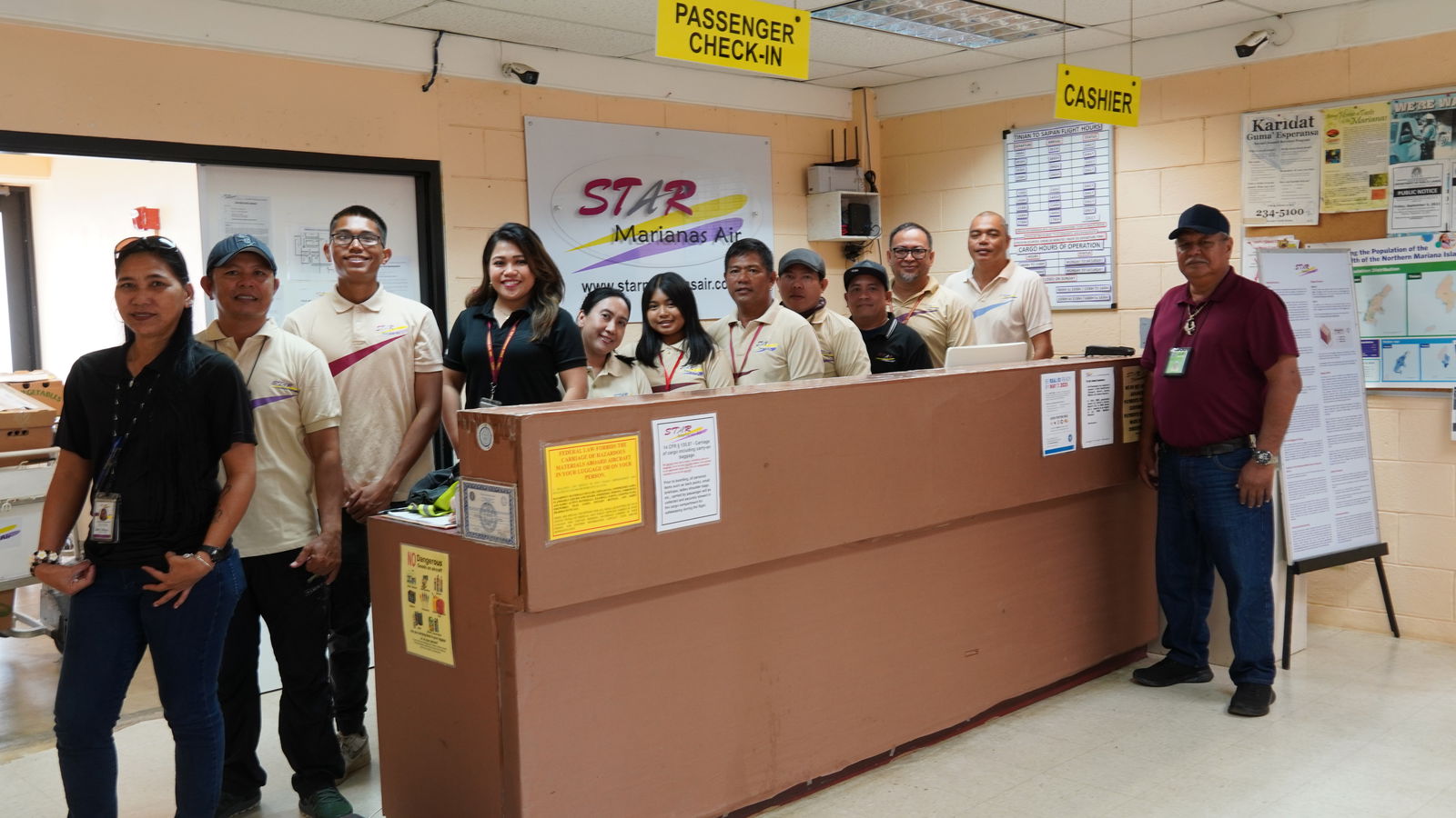 Donna Cabrera and Joe Cruz with SMA Tinian team