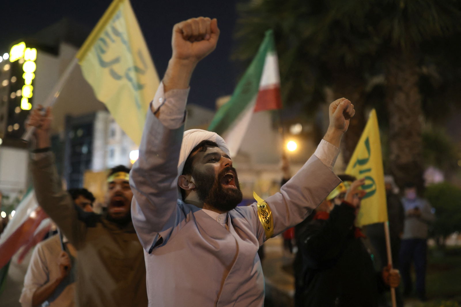 Iranians celebrate on a street, after the IRGC attack on Israel, in Tehran, Iran, April 14, 2024.